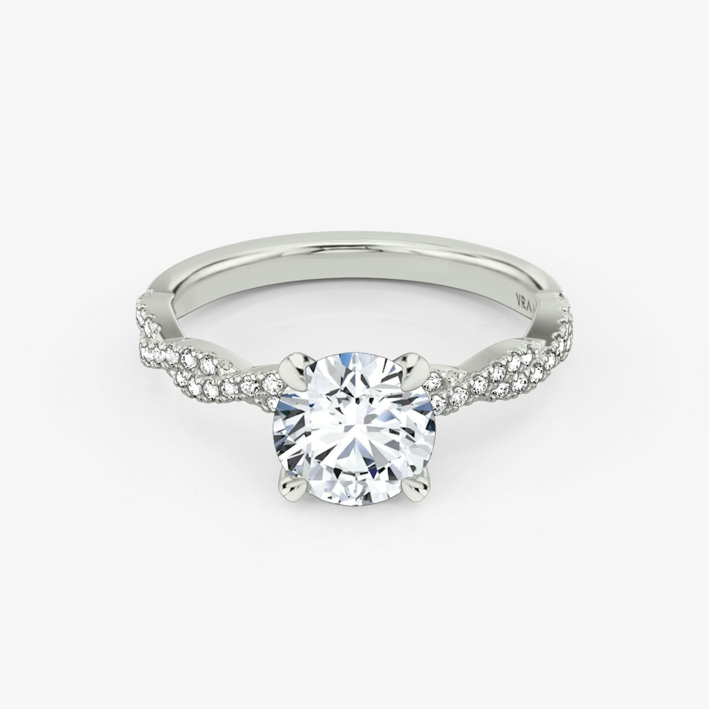 The Twisted Classic | Round Brilliant | Platinum | Band: Double pavé | Carat weight: 2 | Diamond orientation: vertical