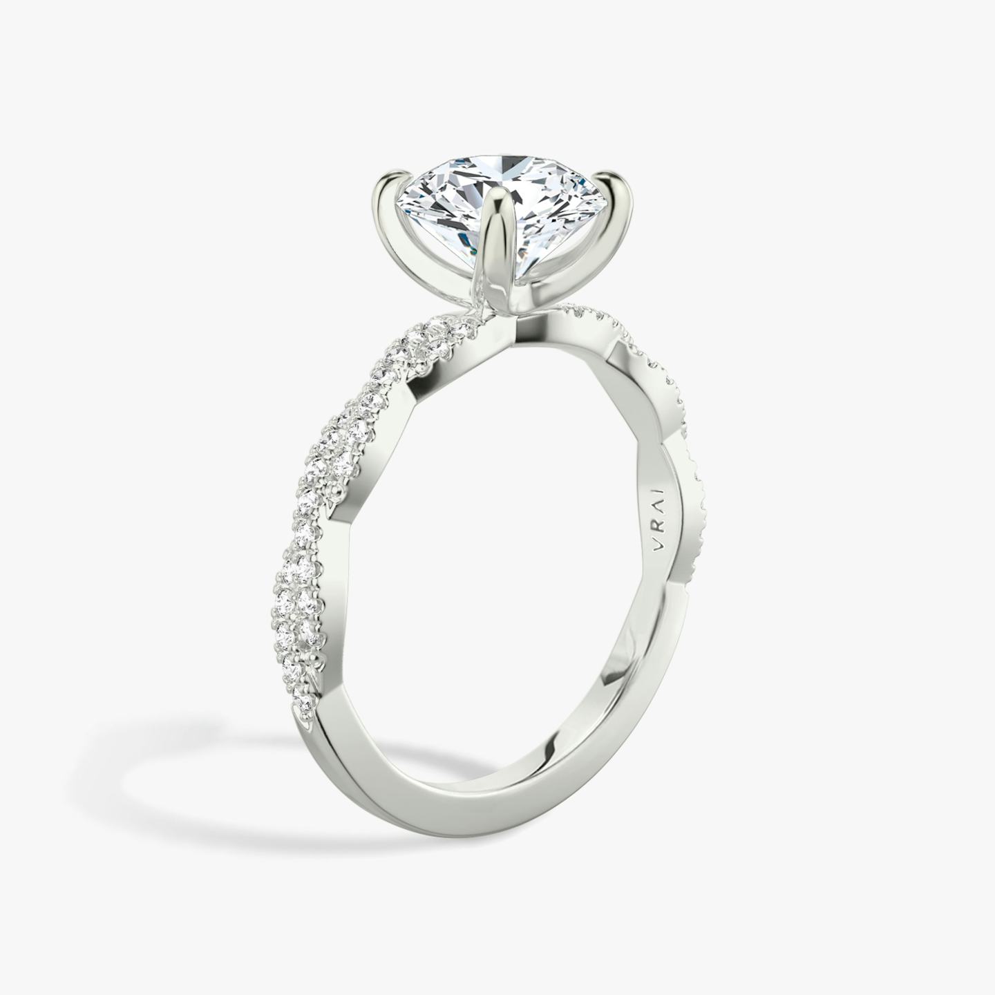 The Twisted Classic | Round Brilliant | Platinum | Band: Double pavé | Carat weight: 1 | Diamond orientation: vertical