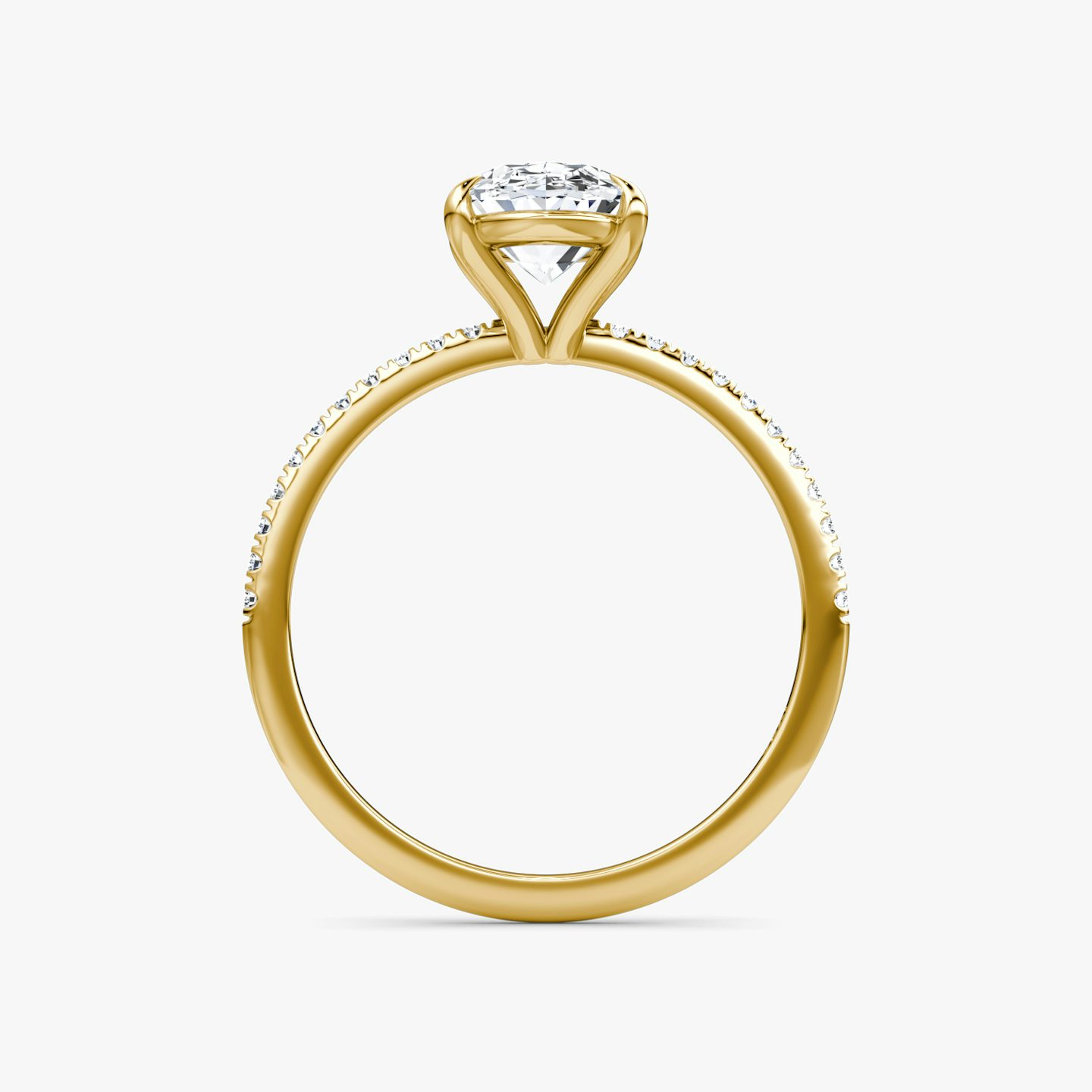 The Petite 4-Prong Solitaire | Oval | 18k | 18k Yellow Gold | Band: Pavé | Diamond orientation: vertical | Carat weight: See full inventory