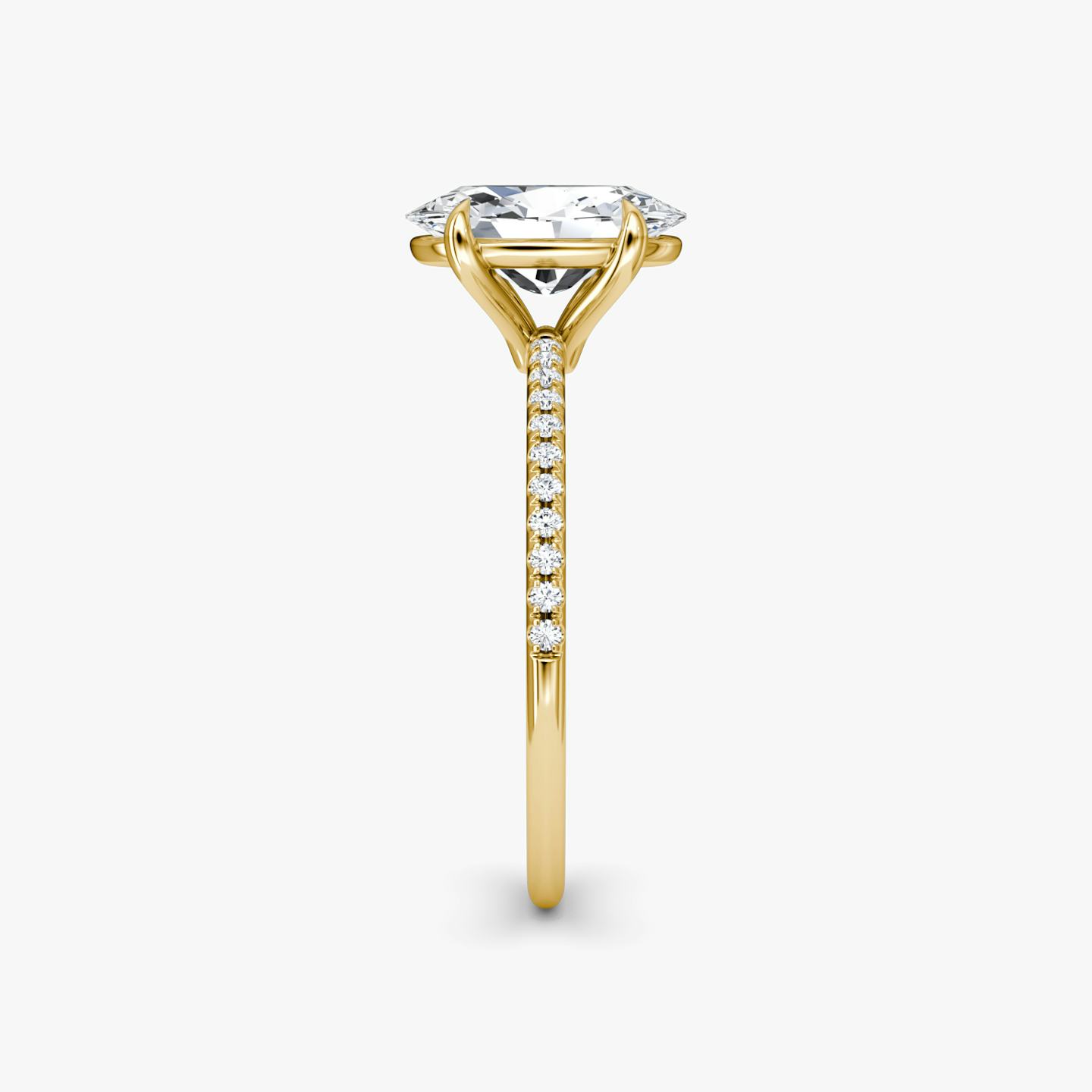 The Petite 4-Prong Solitaire | Oval | 18k | 18k Yellow Gold | Band: Pavé | Diamond orientation: vertical | Carat weight: See full inventory