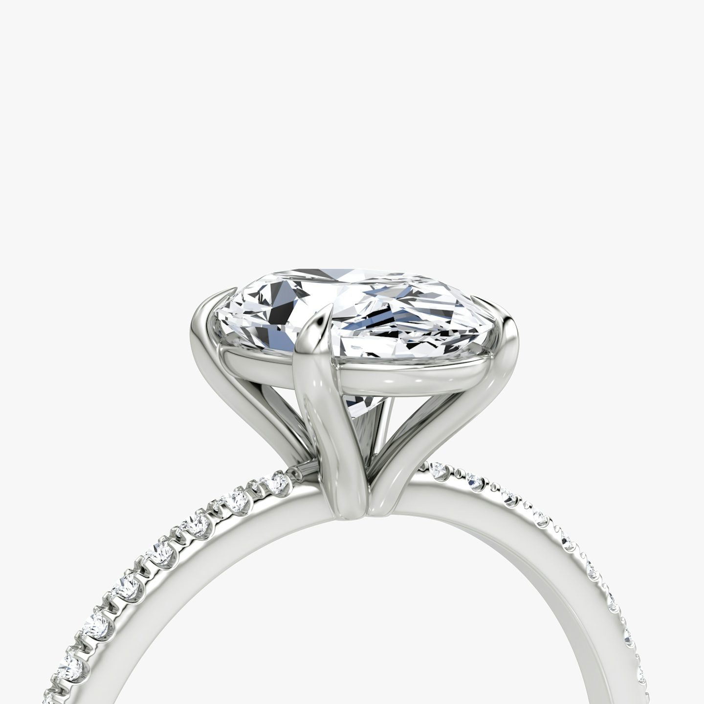 The Petite 4-Prong Solitaire | Oval | Platinum | Band: Pavé | Diamond orientation: vertical | Carat weight: See full inventory