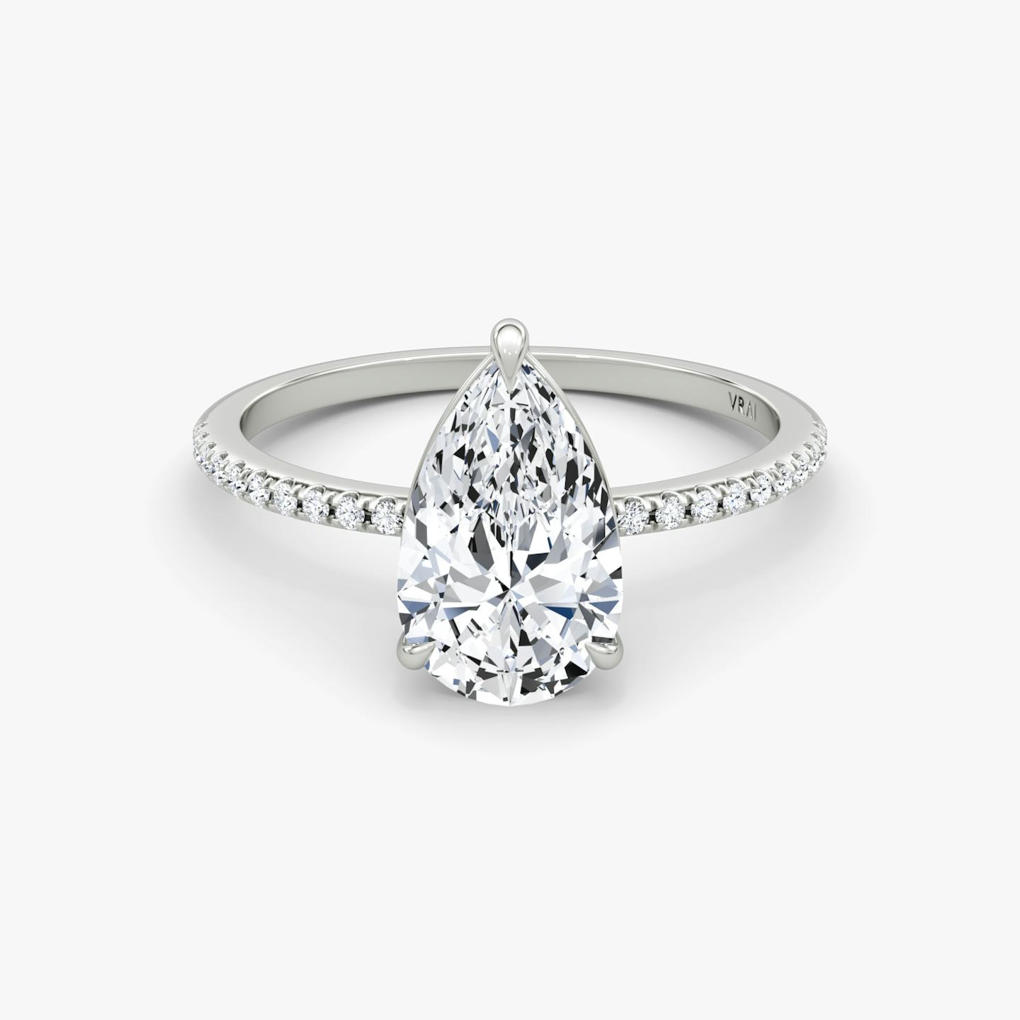 The Petite 4-Prong Solitaire | Pear | Platinum | Band: Pavé | Diamond orientation: vertical | Carat weight: See full inventory