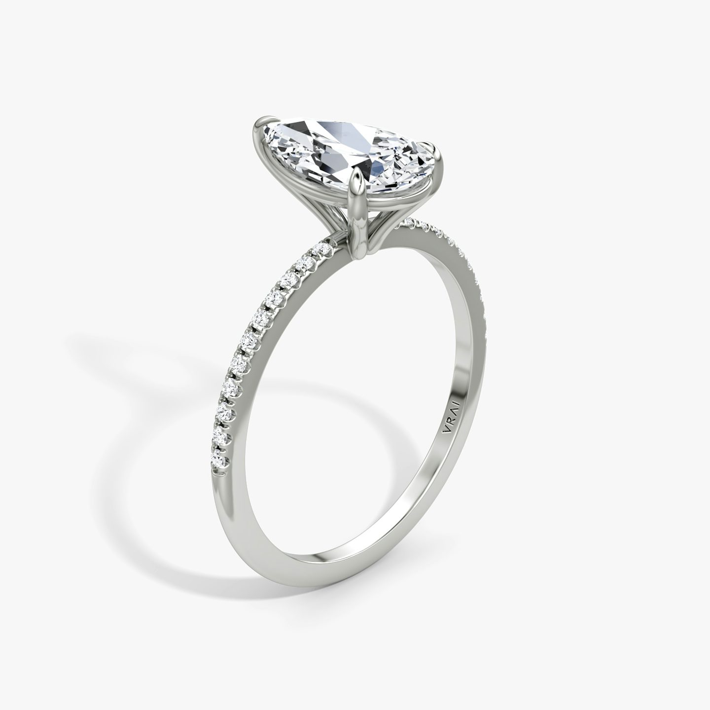 The Petite 4-Prong Solitaire | Pear | 18k | 18k White Gold | Band: Pavé | Diamond orientation: vertical | Carat weight: See full inventory