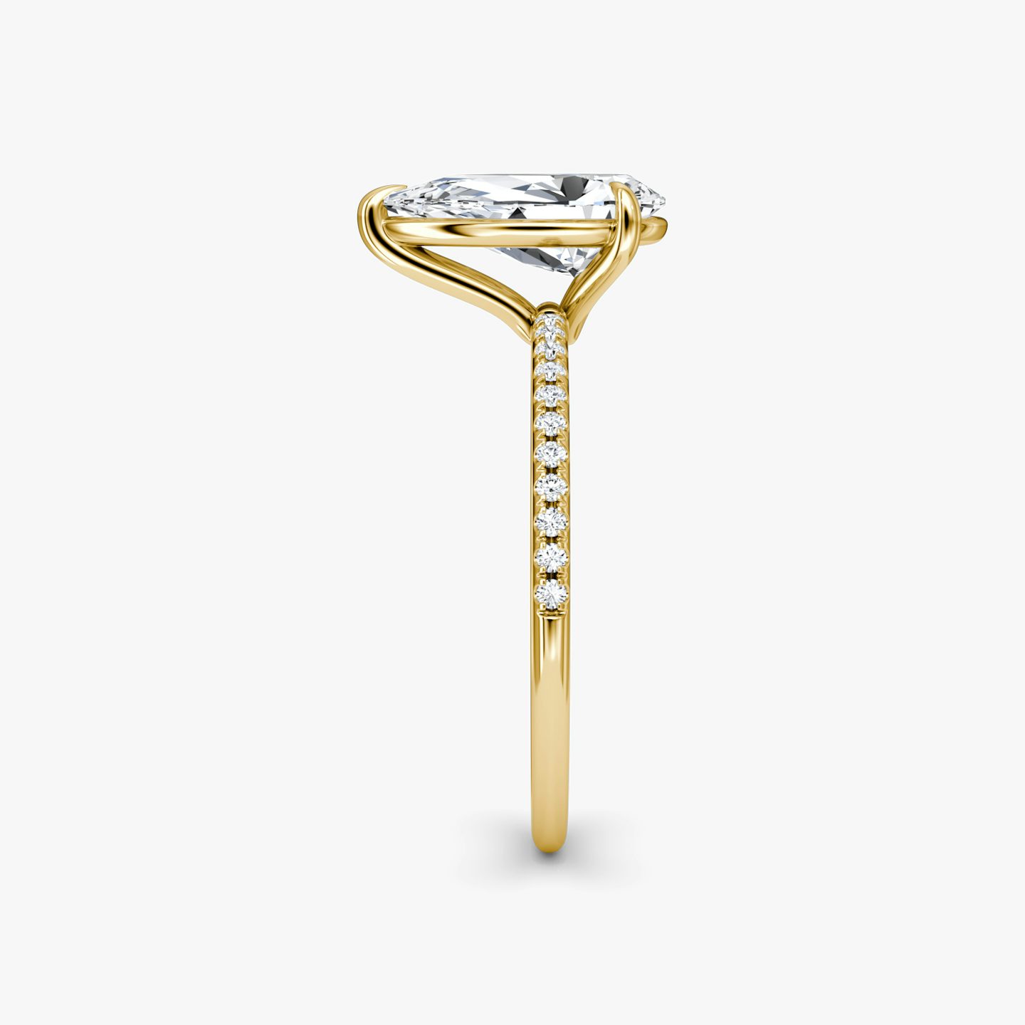The Petite 4-Prong Solitaire | Pear | 18k | 18k Yellow Gold | Band: Pavé | Diamond orientation: vertical | Carat weight: See full inventory