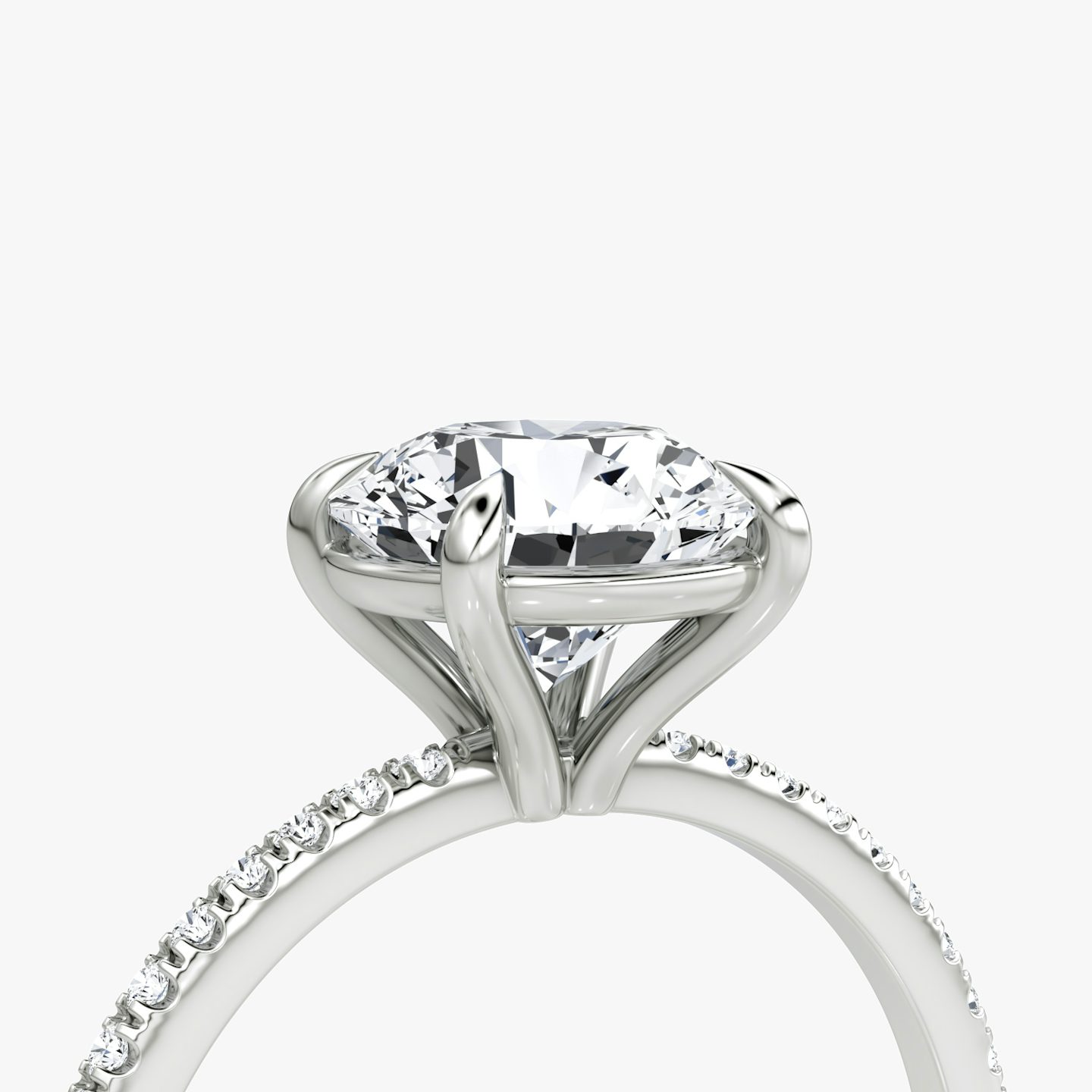 The Petite 4-Prong Solitaire | Round Brilliant | 18k | 18k White Gold | Band: Pavé | Carat weight: 1 | Diamond orientation: vertical