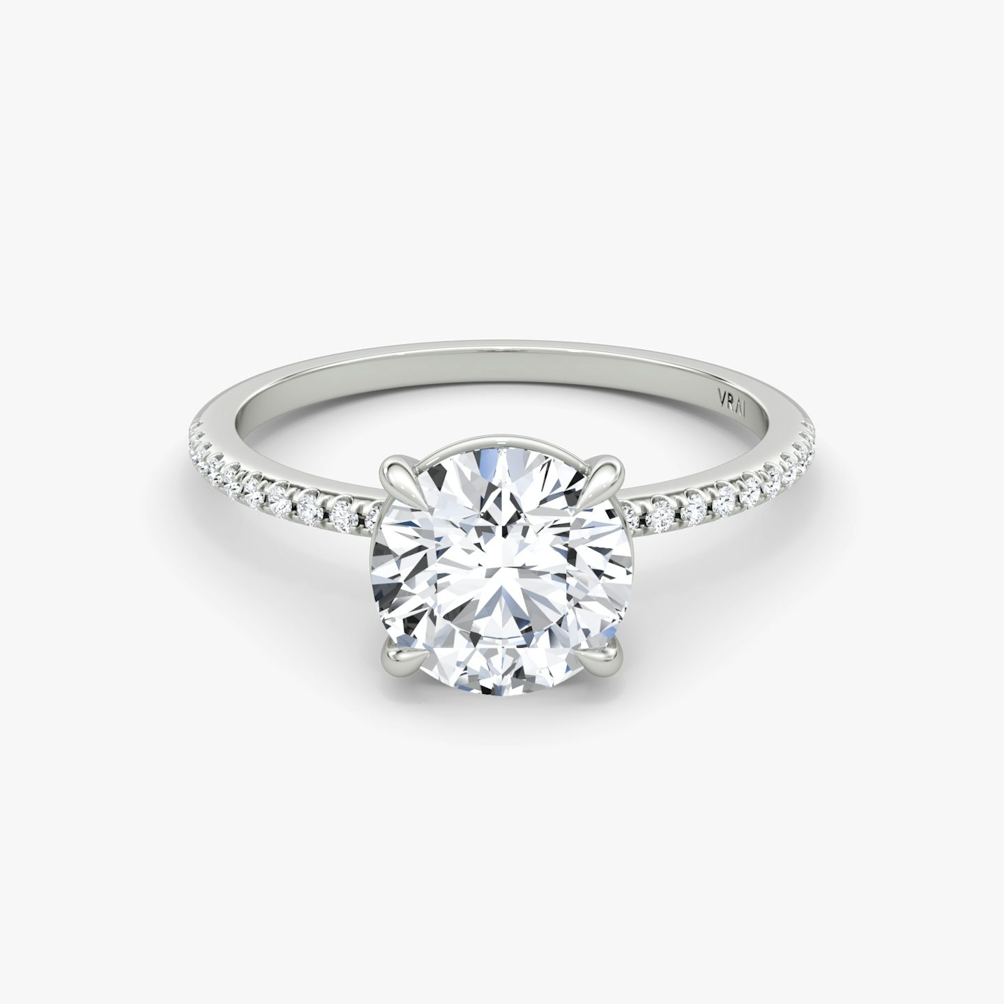 The Petite 4-Prong Solitaire | Round Brilliant | 18k | 18k White Gold | Band: Pavé | Carat weight: See full inventory | Diamond orientation: vertical