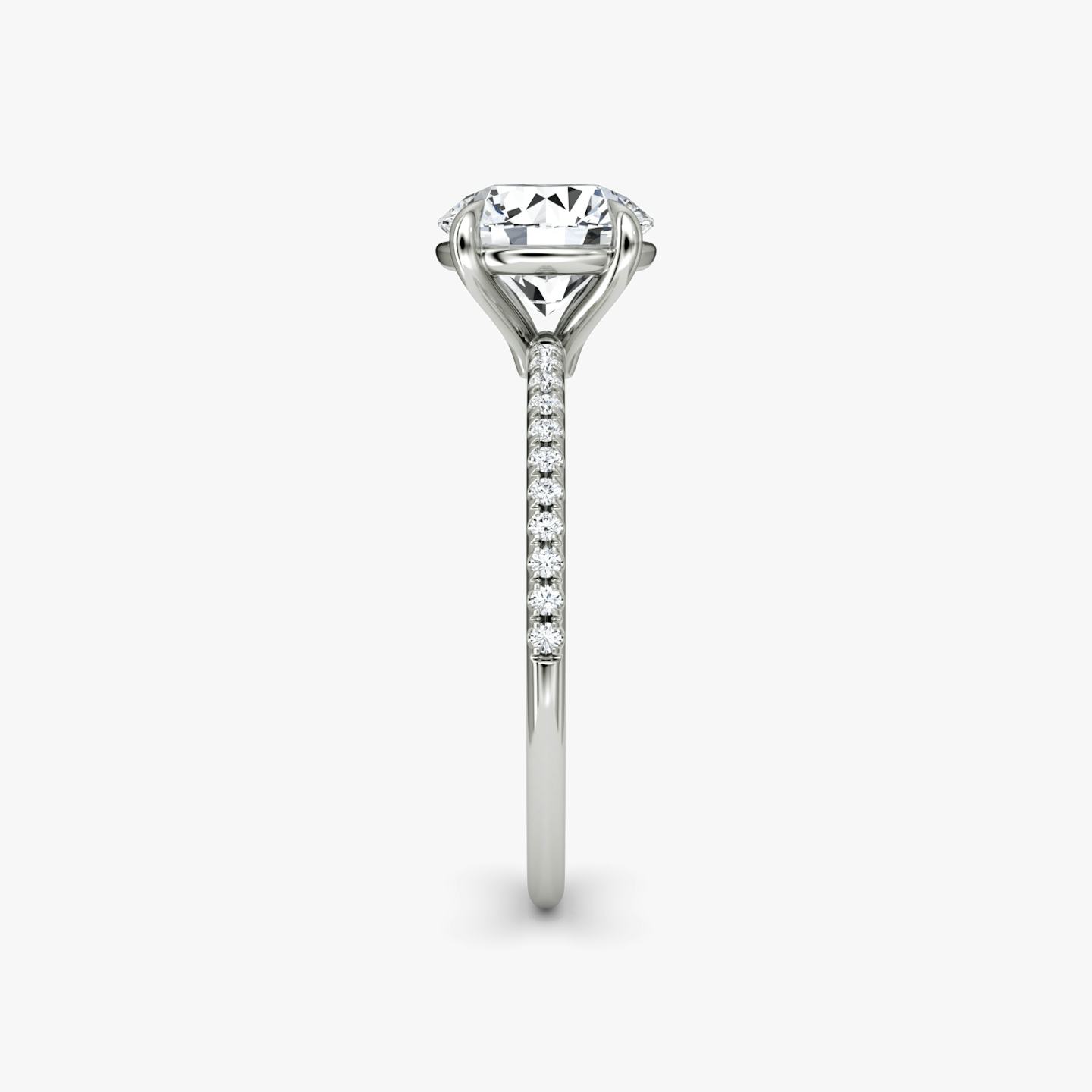 The Petite 4-Prong Solitaire | Round Brilliant | 18k | 18k White Gold | Band: Pavé | Carat weight: 1 | Diamond orientation: vertical