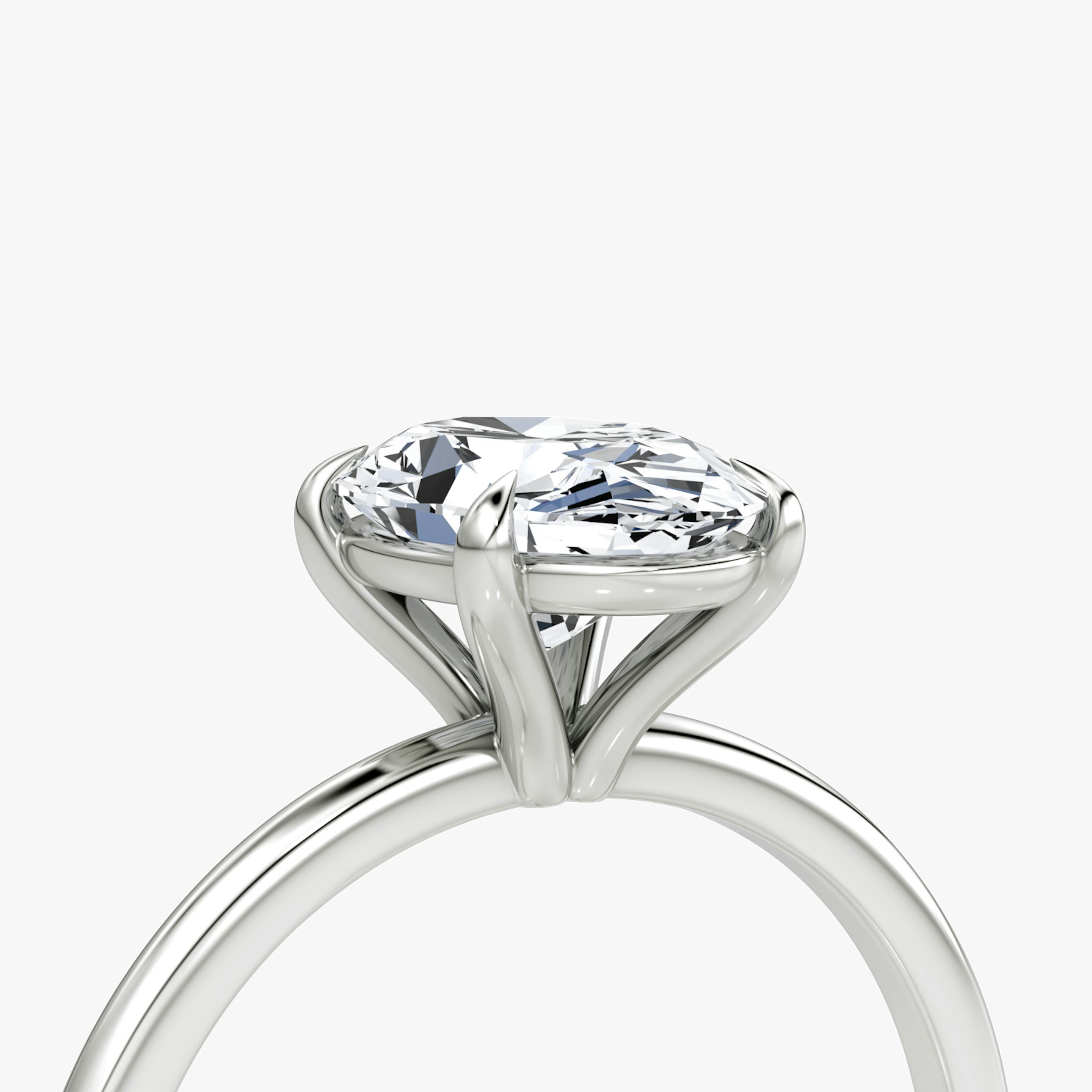 The Petite 4-Prong Solitaire | Oval | 18k | 18k White Gold | Band: Plain | Diamond orientation: vertical | Carat weight: See full inventory