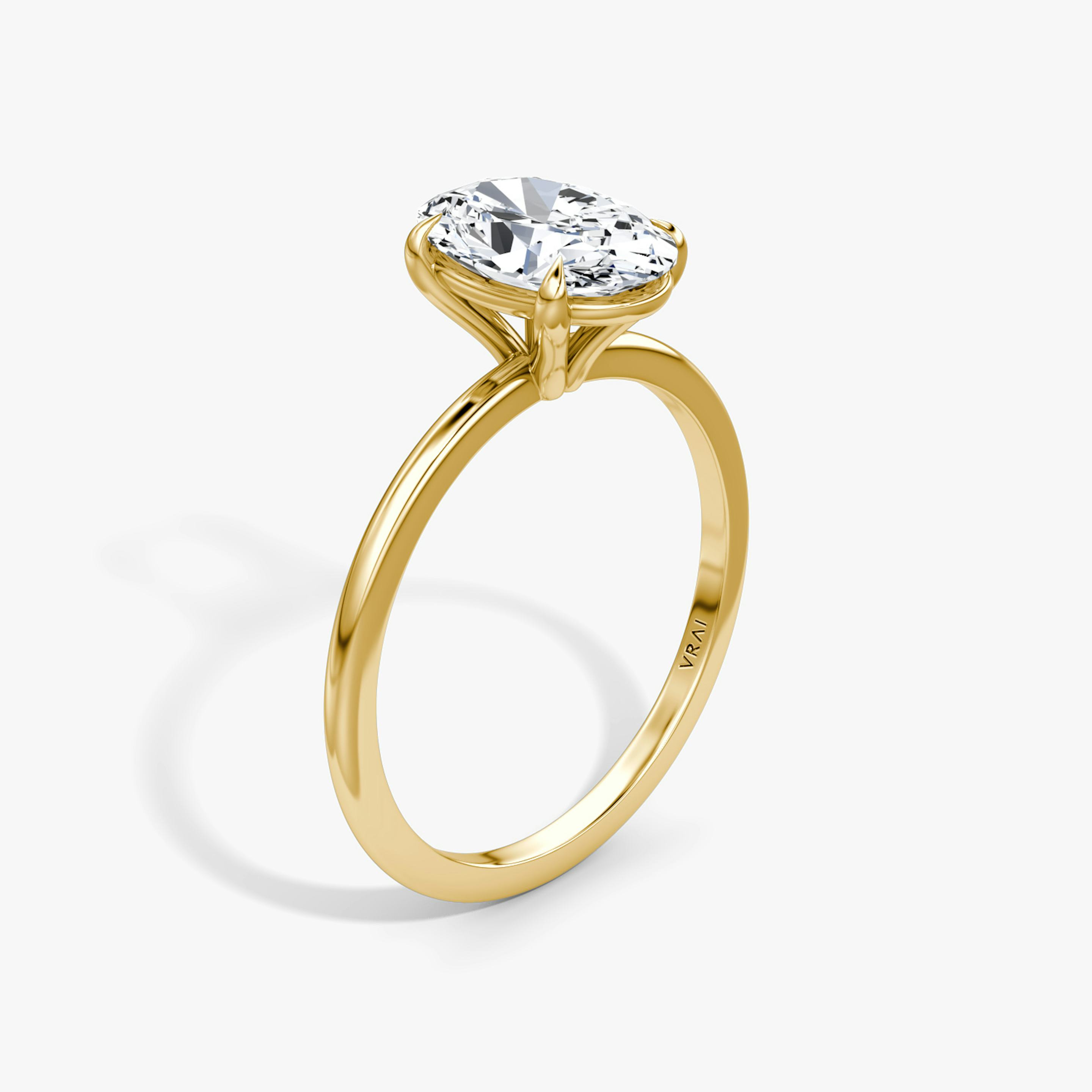 The Petite 4-Prong Solitaire | Oval | 18k | 18k Yellow Gold | Band: Plain | Diamond orientation: vertical | Carat weight: See full inventory