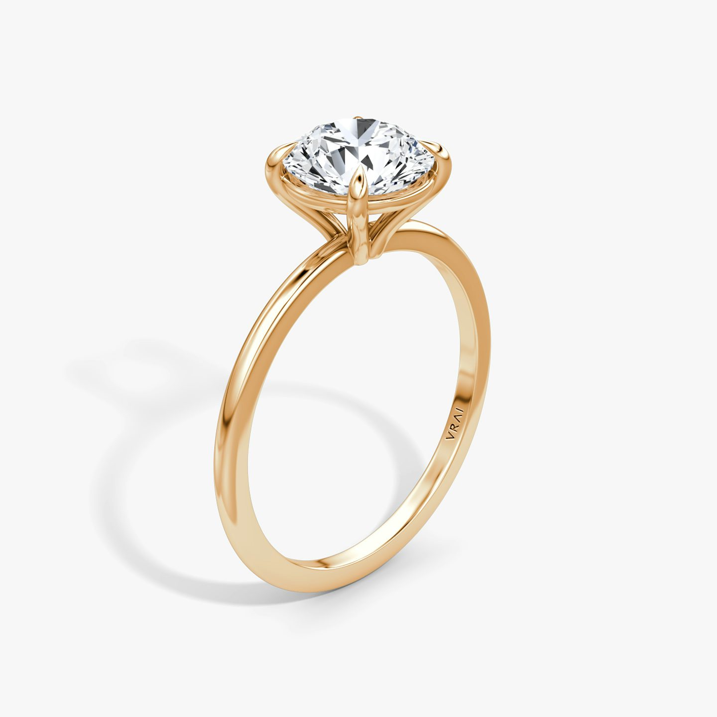 The Petite 4-Prong Solitaire | Round Brilliant | 14k | 14k Rose Gold | Band: Plain | Carat weight: See full inventory | Diamond orientation: vertical