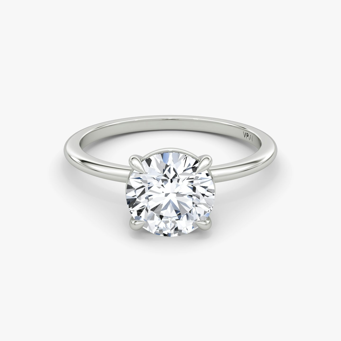 The Petite 4-Prong Solitaire | Round Brilliant | 18k | 18k White Gold | Band: Plain | Carat weight: See full inventory | Diamond orientation: vertical
