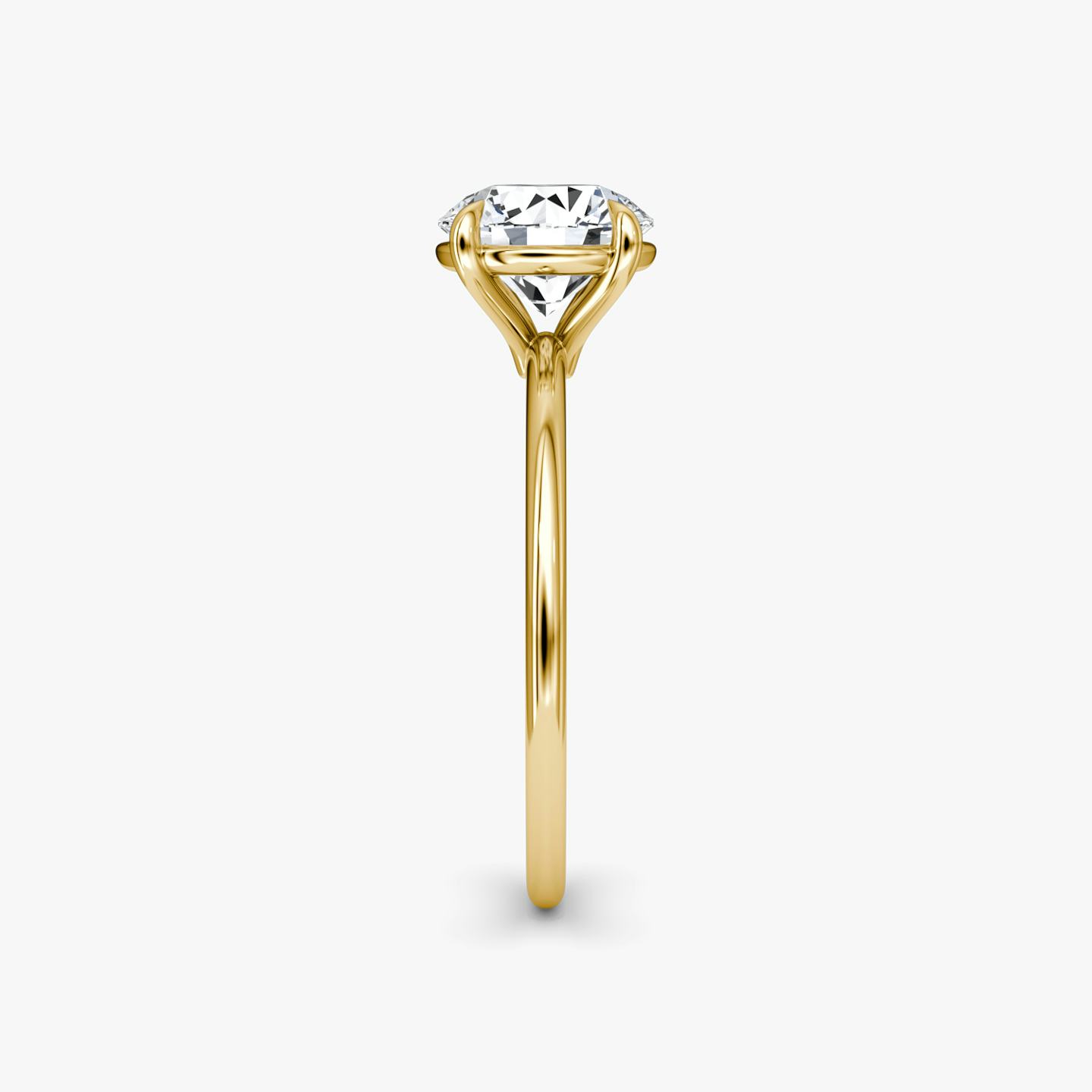 The Petite 4-Prong Solitaire | Round Brilliant | 18k | 18k Yellow Gold | Band: Plain | Carat weight: See full inventory | Diamond orientation: vertical