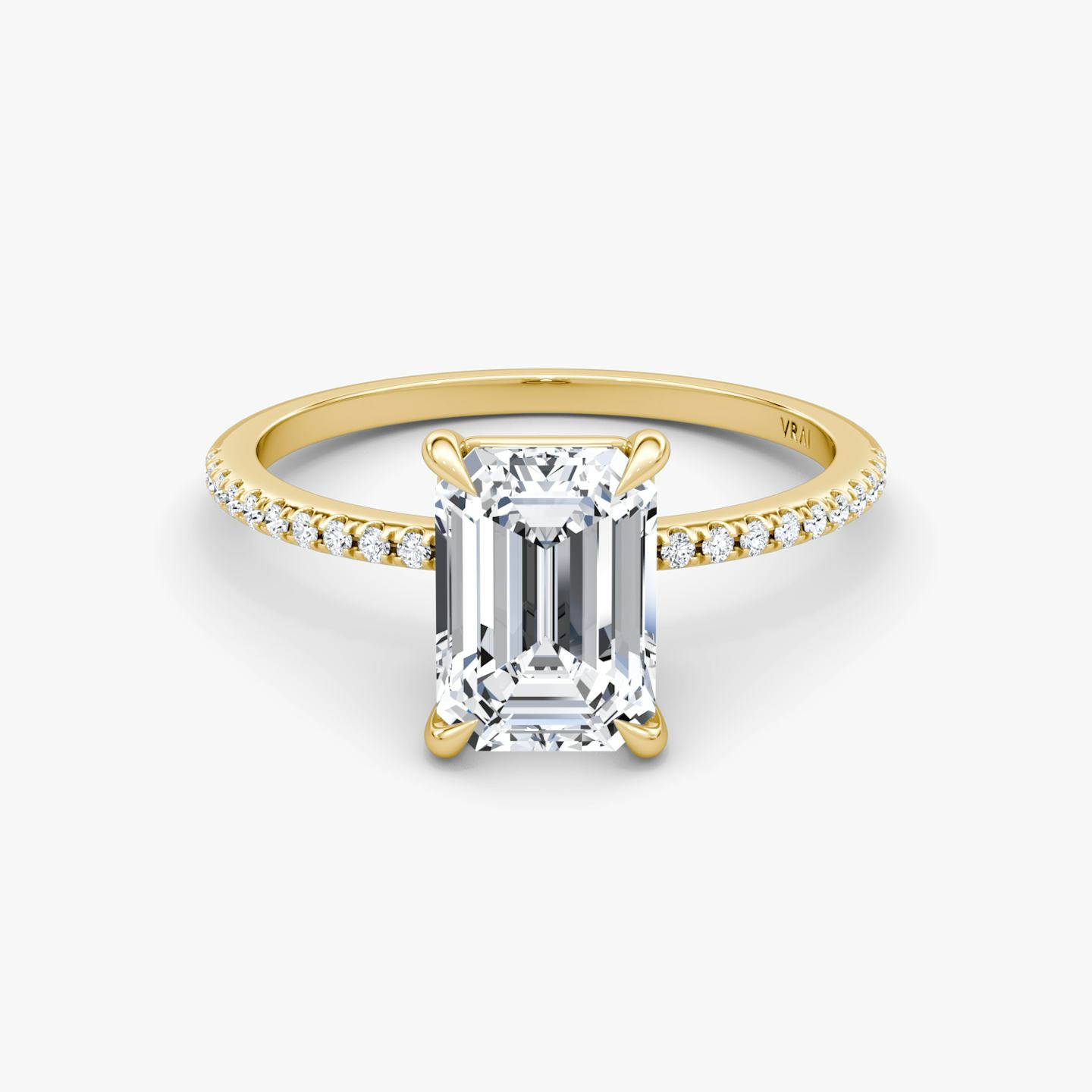 The Petite 4-Prong Solitaire | Emerald | 18k | 18k Yellow Gold | Band: Pavé | Diamond orientation: vertical | Carat weight: See full inventory