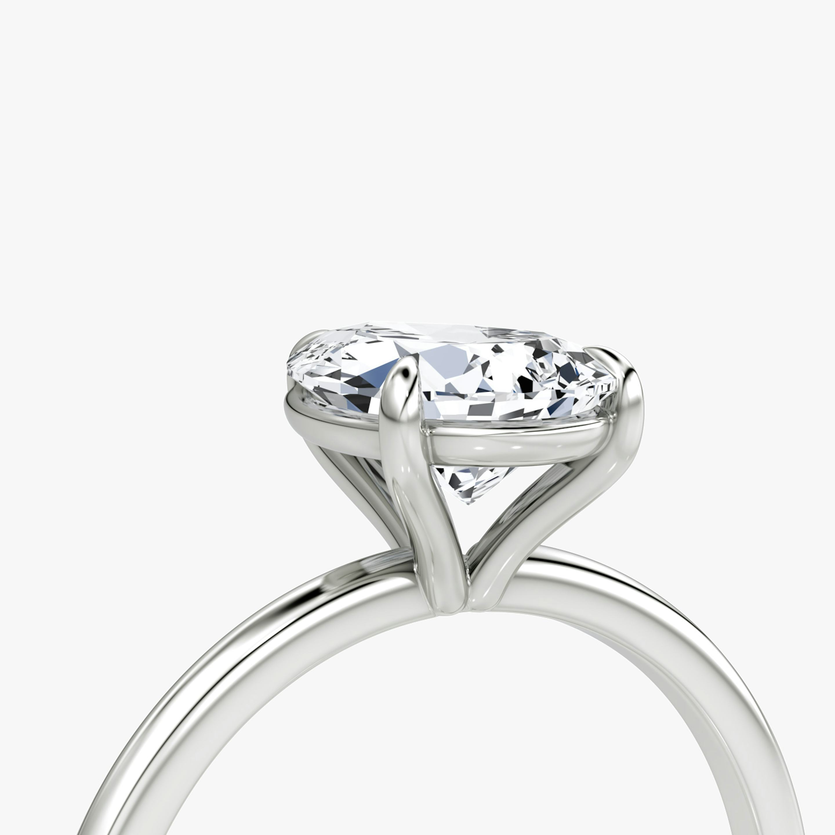 The Petite 4-Prong Solitaire | Pear | Platinum | Band: Plain | Diamond orientation: vertical | Carat weight: See full inventory