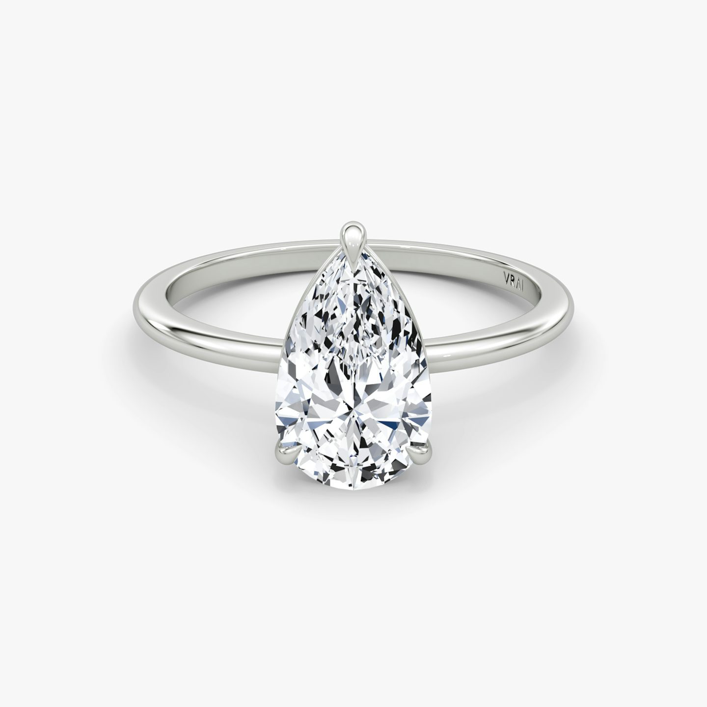 The Petite 4-Prong Solitaire | Pear | 18k | 18k White Gold | Band: Plain | Diamond orientation: vertical | Carat weight: See full inventory