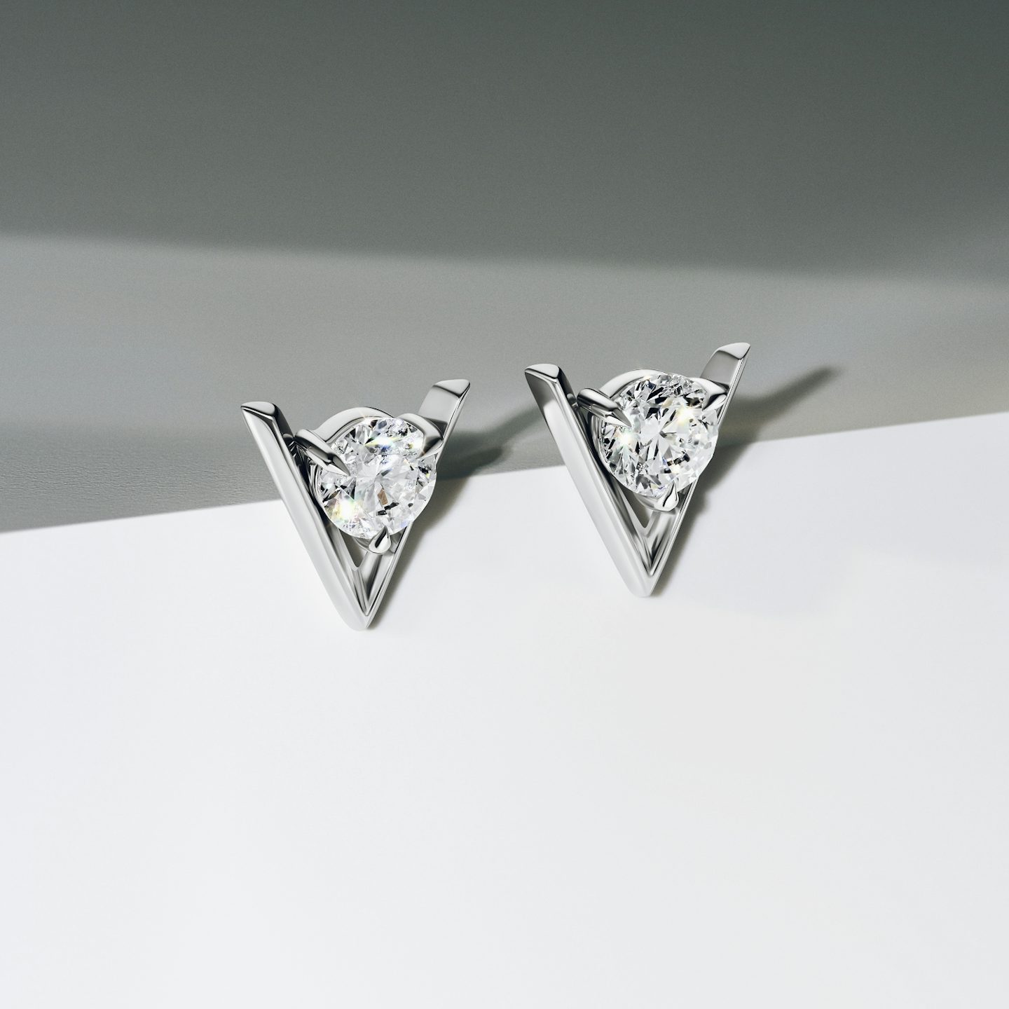 VRAI V Solitaire Studs | Round Brilliant | 14k | 18k Yellow Gold | Carat weight: 1/2