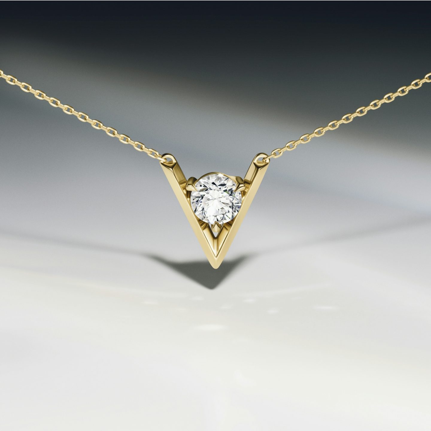 VRAI V Solitaire Necklace | Round Brilliant | Sterling Silver | Carat weight: 1/10