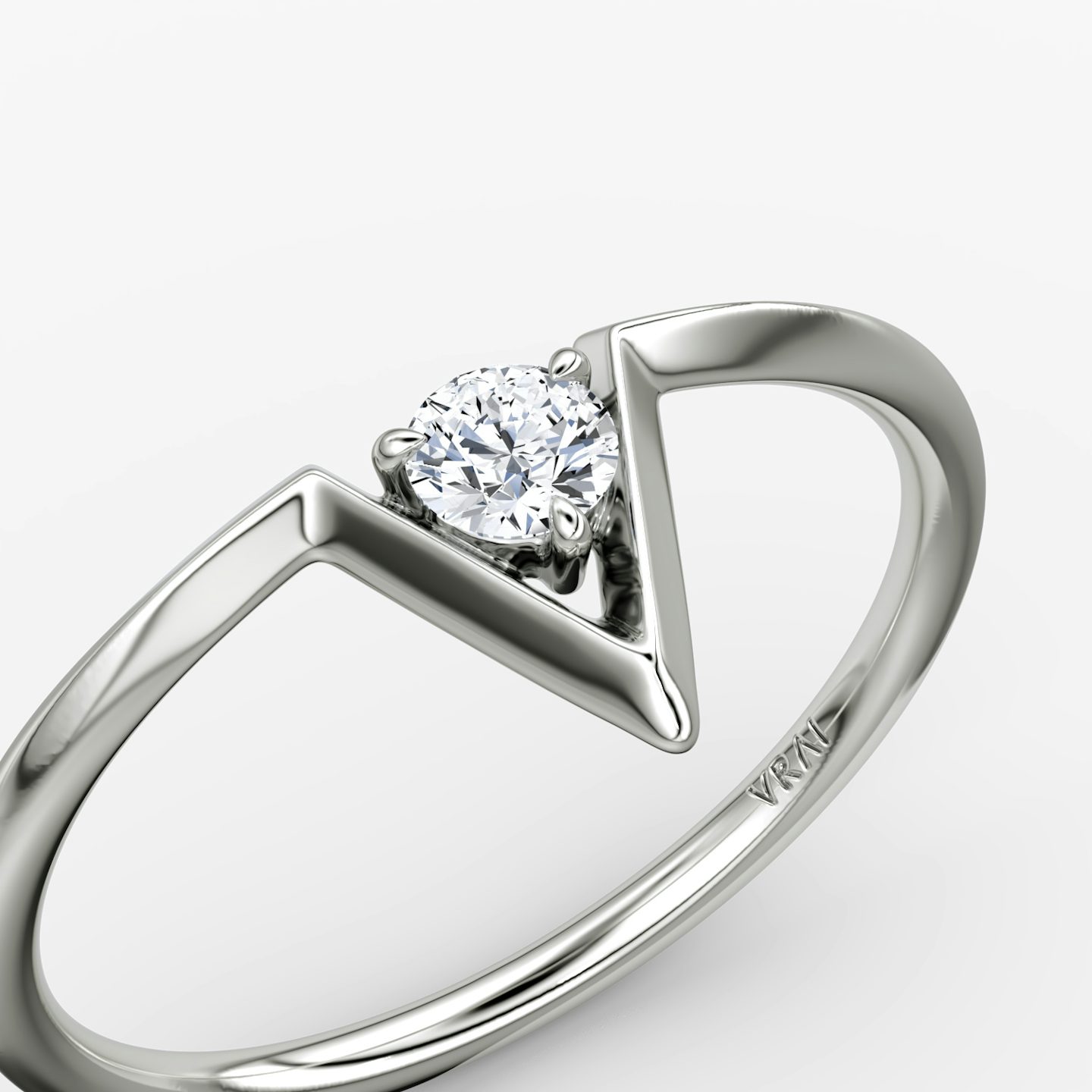 VRAI V Solitaire Ring | Round Brilliant | 14k | 18k White Gold | Carat weight: 1/10