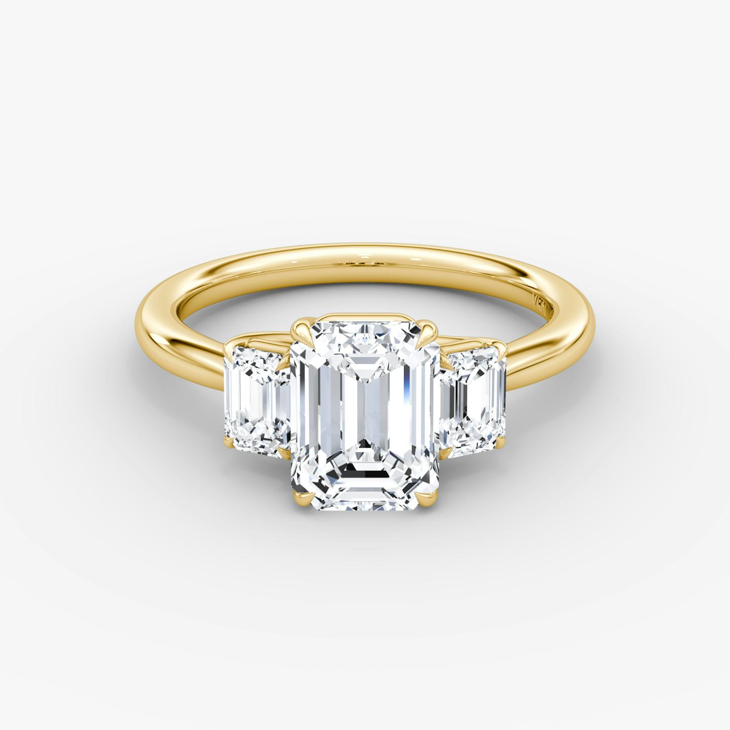 The Trellis Three Stone | Emerald | 18k | 18k Yellow Gold | Band: Plain | Diamond orientation: vertical | Carat weight: See full inventory