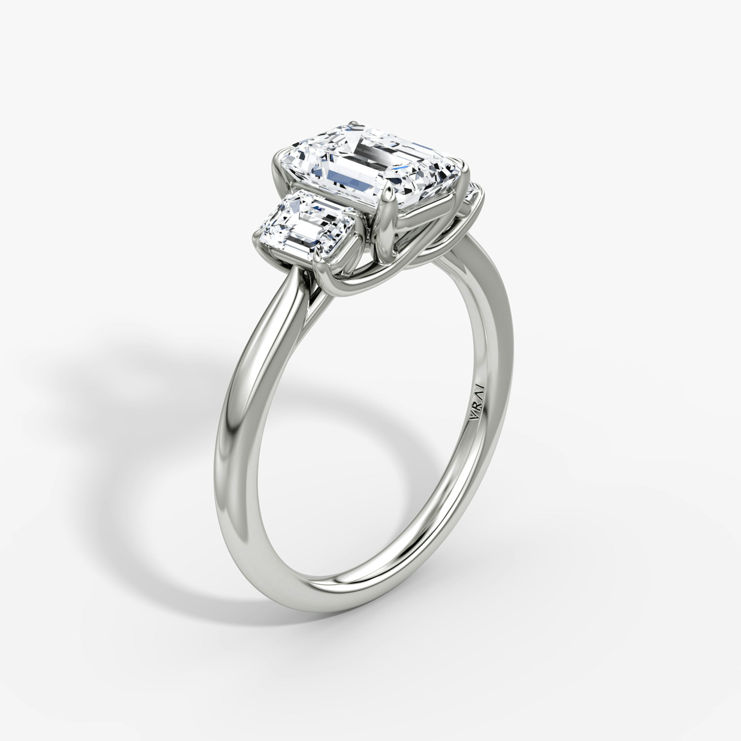 The Trellis Three Stone | Emerald | 18k | 18k White Gold | Band: Plain | Diamond orientation: vertical | Carat weight: See full inventory