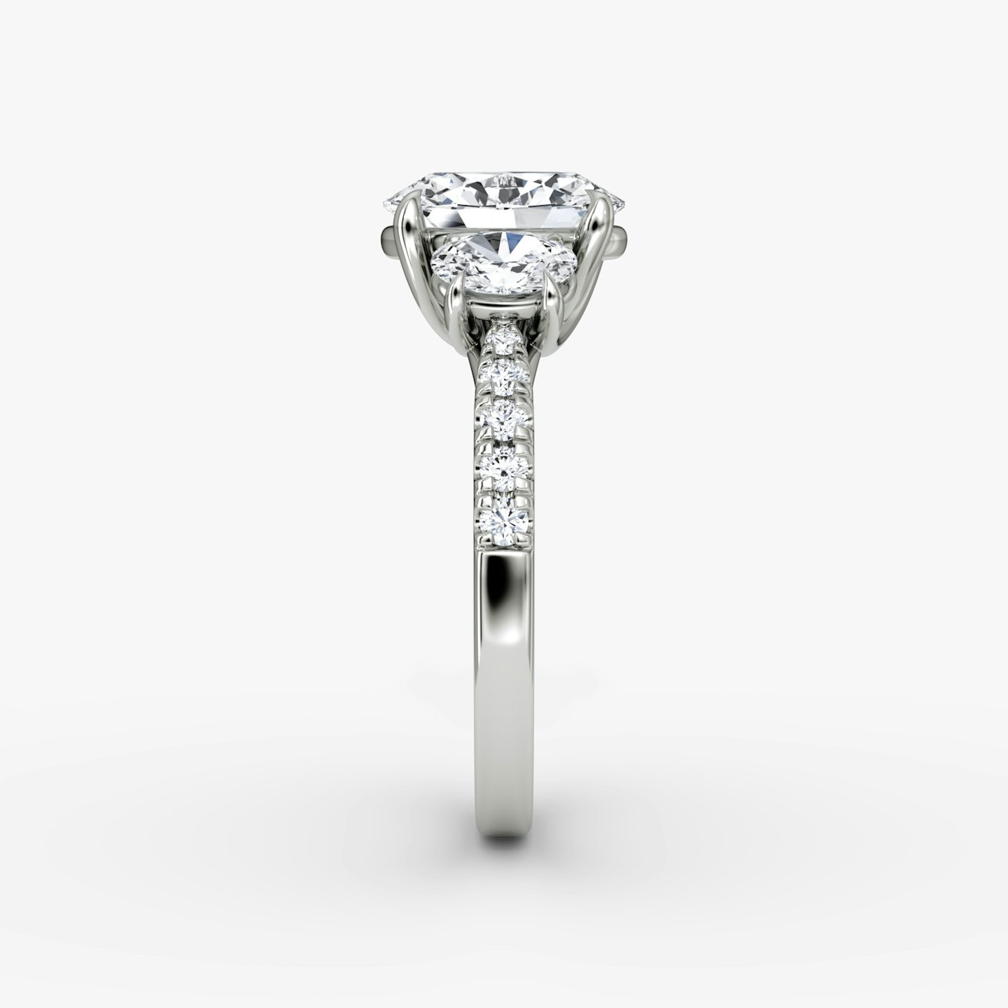 The Trellis Three Stone | Oval | 18k | 18k White Gold | Band: Pavé | Diamond orientation: vertical | Carat weight: See full inventory