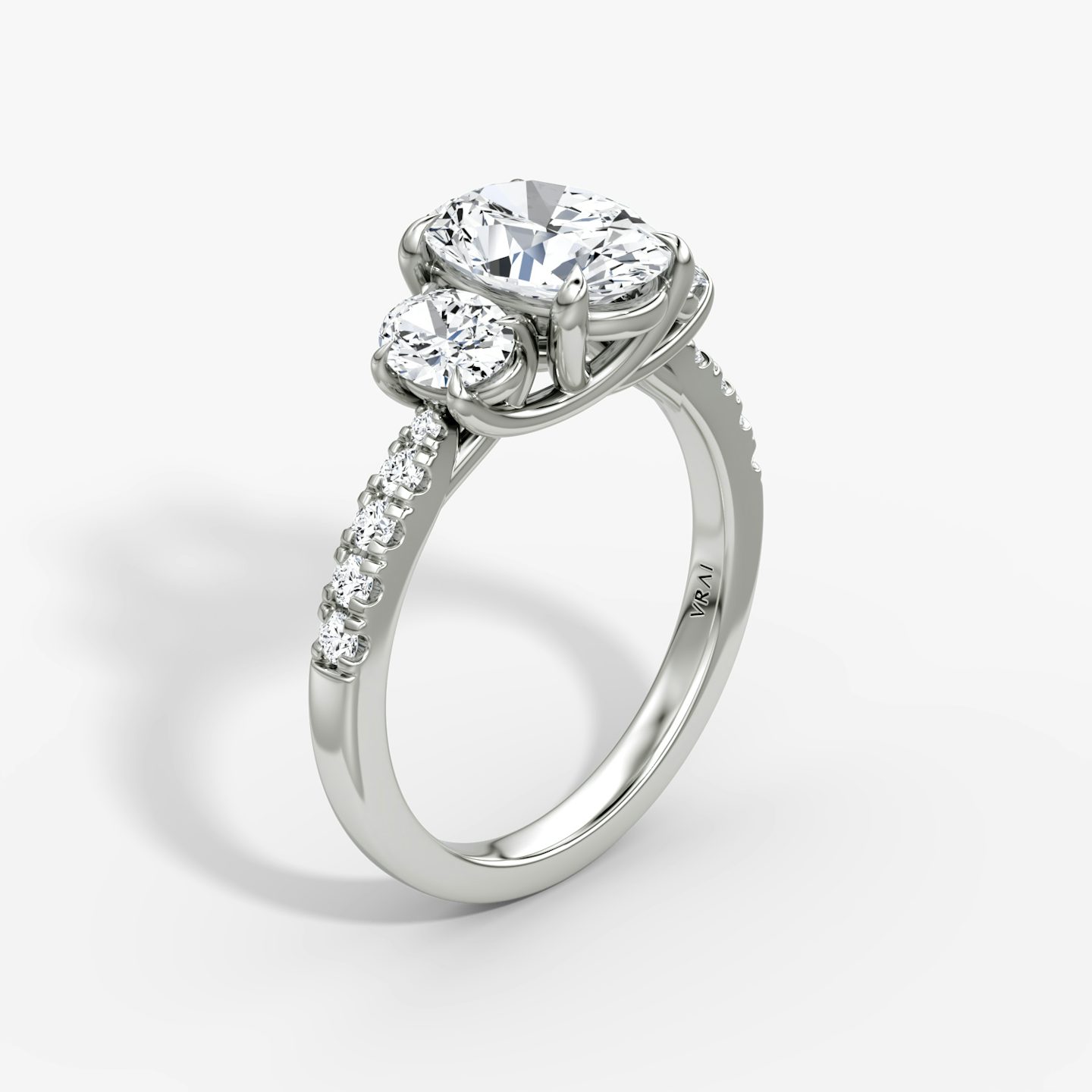 The Trellis Three Stone | Oval | 18k | 18k White Gold | Band: Pavé | Diamond orientation: vertical | Carat weight: See full inventory
