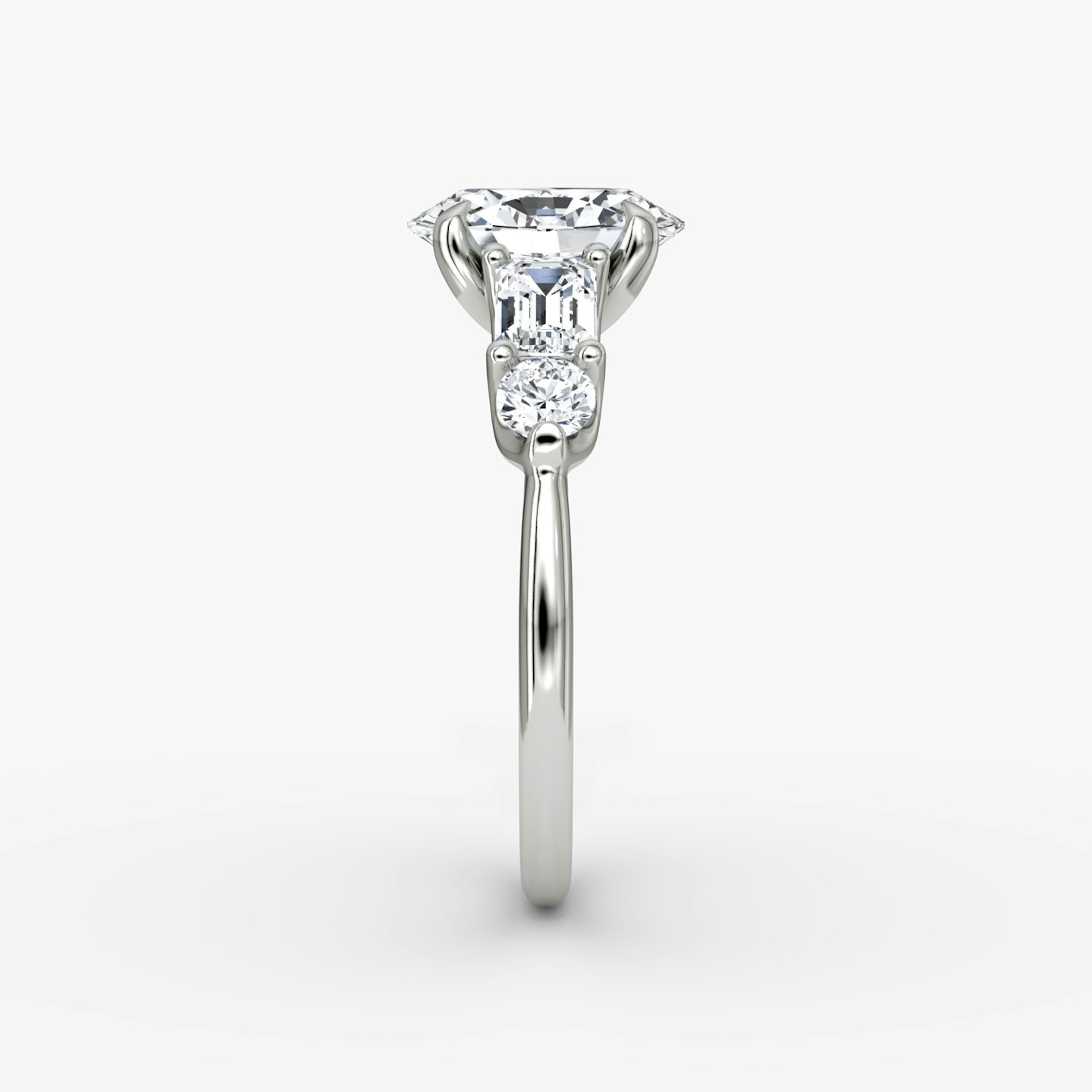 The Mixed Shape | Oval | 18k | 18k White Gold | Side stone shape: Emerald and Round Brilliant | Diamond orientation: vertical | sideStoneOrientation: Horizontal | Carat weight: See full inventory