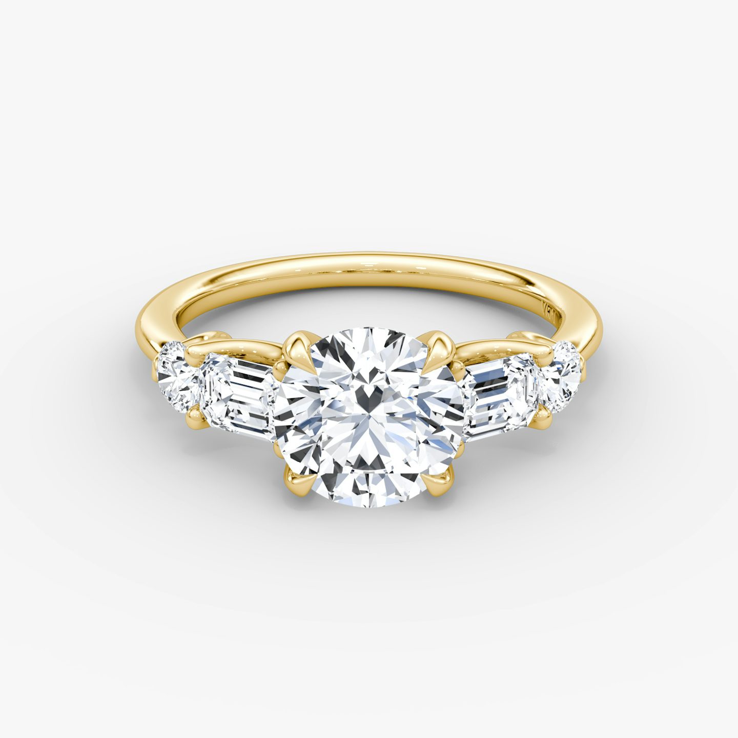 The Mixed Shape | Round Brilliant | 18k | 18k Yellow Gold | Carat weight: See full inventory | Side stone shape: Emerald and Round Brilliant | Diamond orientation: vertical | sideStoneOrientation: Horizontal