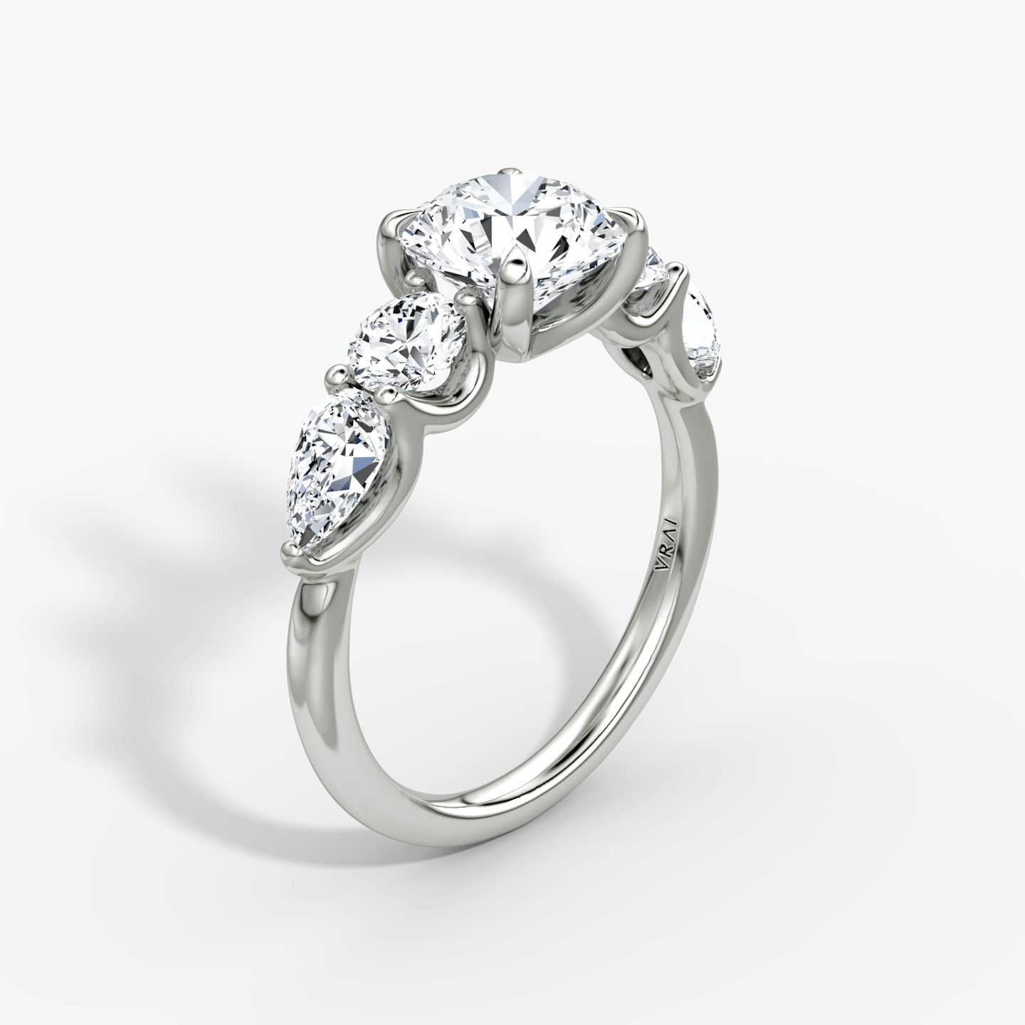 The Mixed Shape | Round Brilliant | 18k | 18k White Gold | Carat weight: See full inventory | Side stone shape: Round Brilliant and Pear | Diamond orientation: vertical | sideStoneOrientation: Horizontal