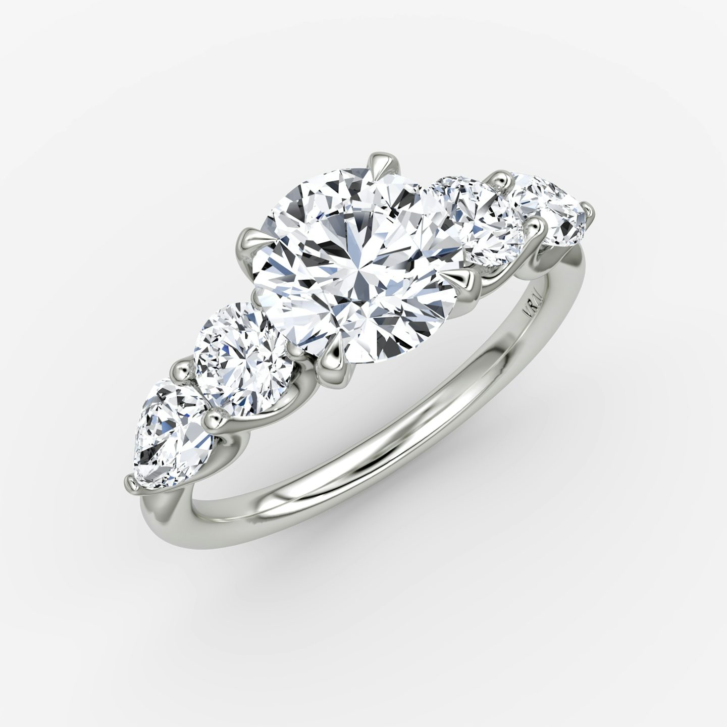 The Mixed Shape | Round Brilliant | 18k | 18k White Gold | Carat weight: See full inventory | Side stone shape: Round Brilliant and Pear | Diamond orientation: vertical | sideStoneOrientation: Horizontal
