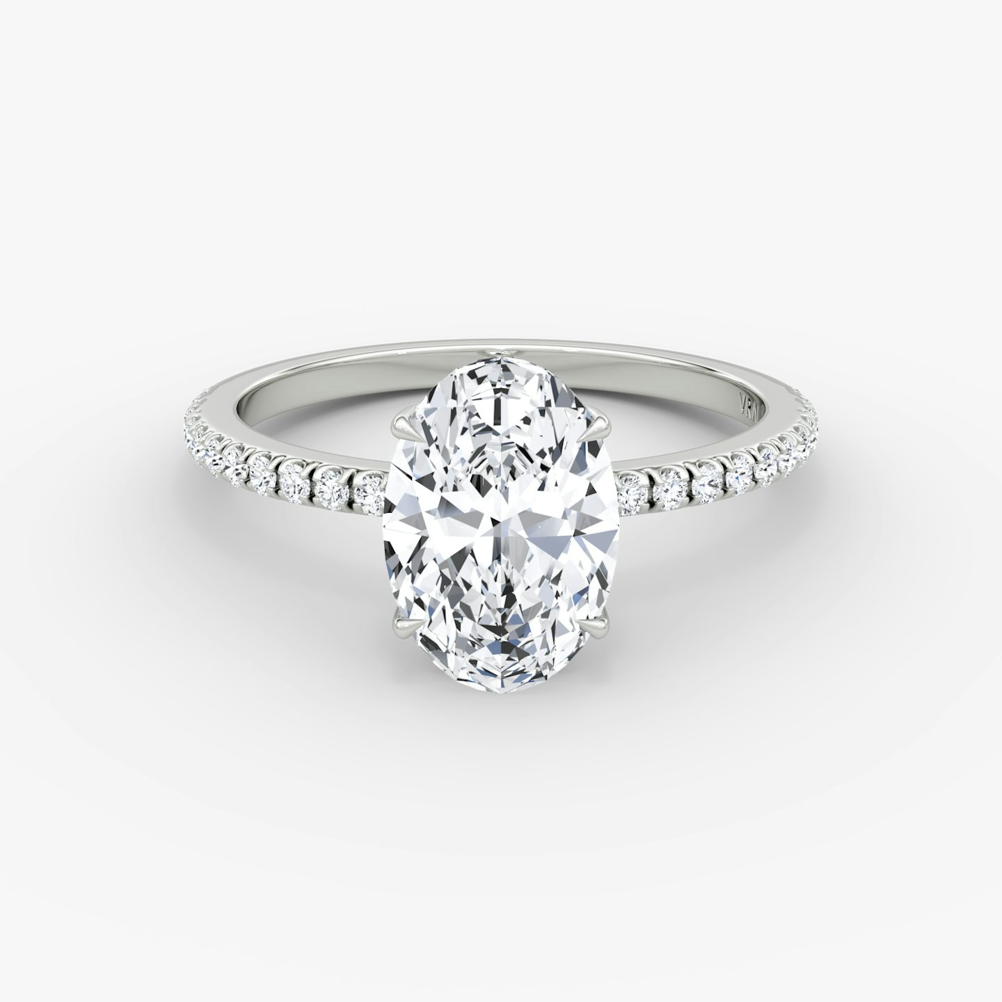 The Signature | Oval | 18k | 18k White Gold | Band: Pavé | Band width: Standard | Setting style: Hidden Halo | Diamond orientation: vertical | Carat weight: See full inventory