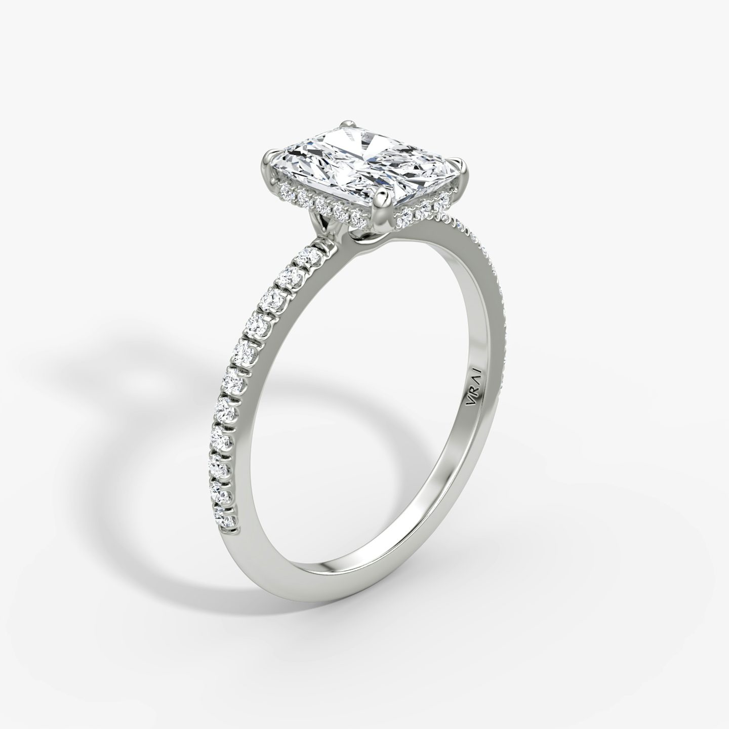 The Signature | Radiant | Platinum | Band: Pavé | Band width: Standard | Setting style: Hidden Halo | Diamond orientation: vertical | Carat weight: See full inventory