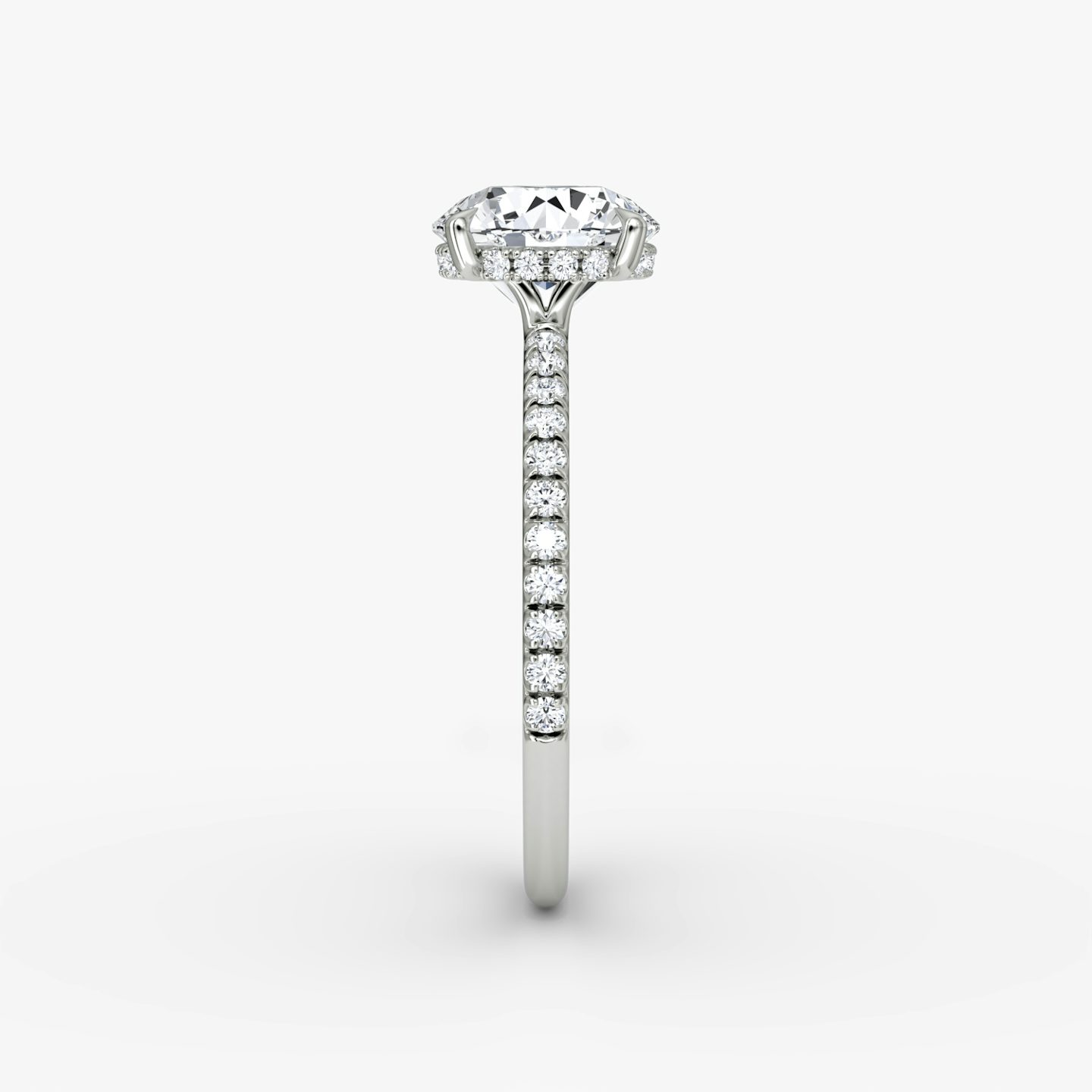 The Signature | Round Brilliant | Platinum | Band width: Standard | Band: Pavé | Setting style: Hidden Halo | Carat weight: See full inventory | Diamond orientation: Horizontal