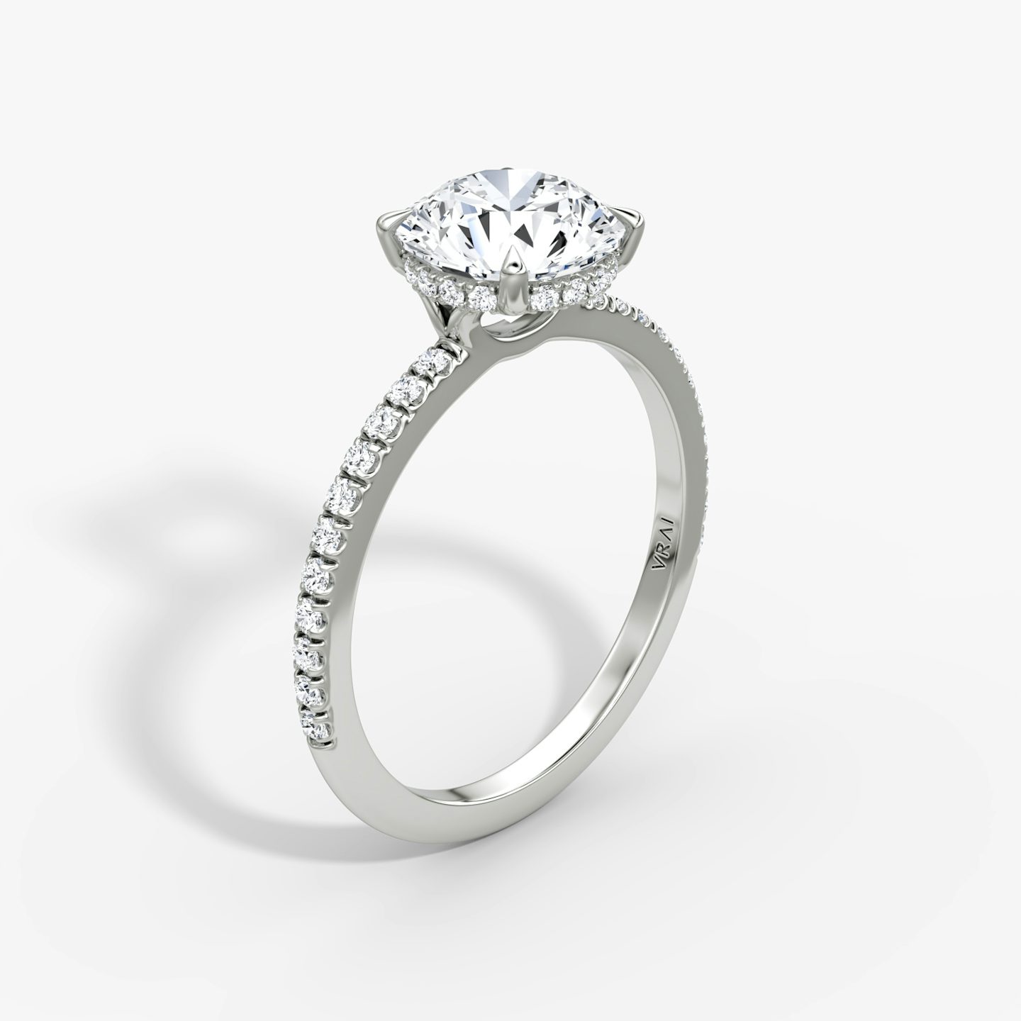 The Signature | Round Brilliant | 18k | 18k White Gold | Band: Pavé | Band width: Standard | Carat weight: See full inventory | Setting style: Hidden Halo | Diamond orientation: Horizontal