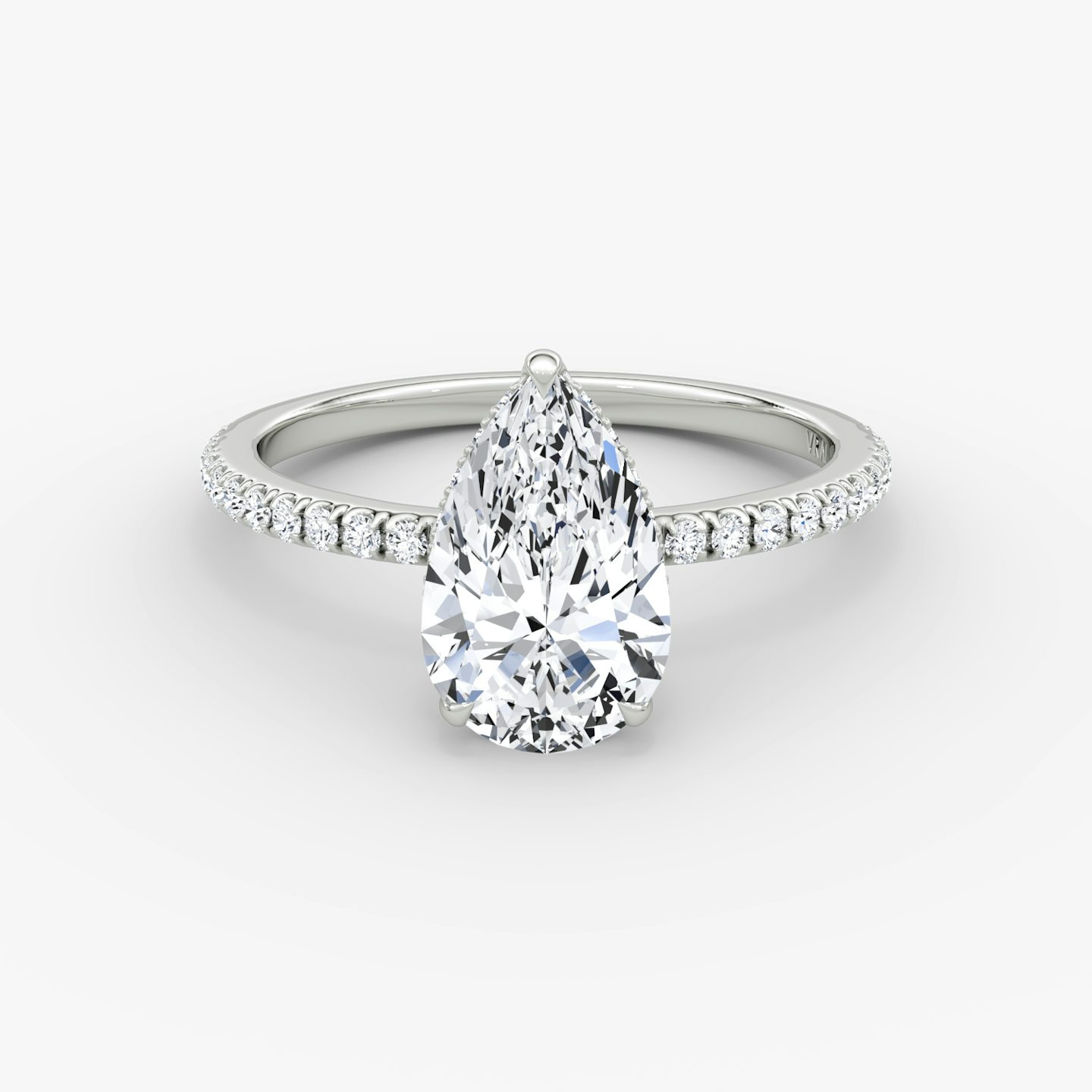The Signature | Pear | Platinum | Band: Pavé | Band width: Standard | Setting style: Hidden Halo | Diamond orientation: vertical | Carat weight: See full inventory