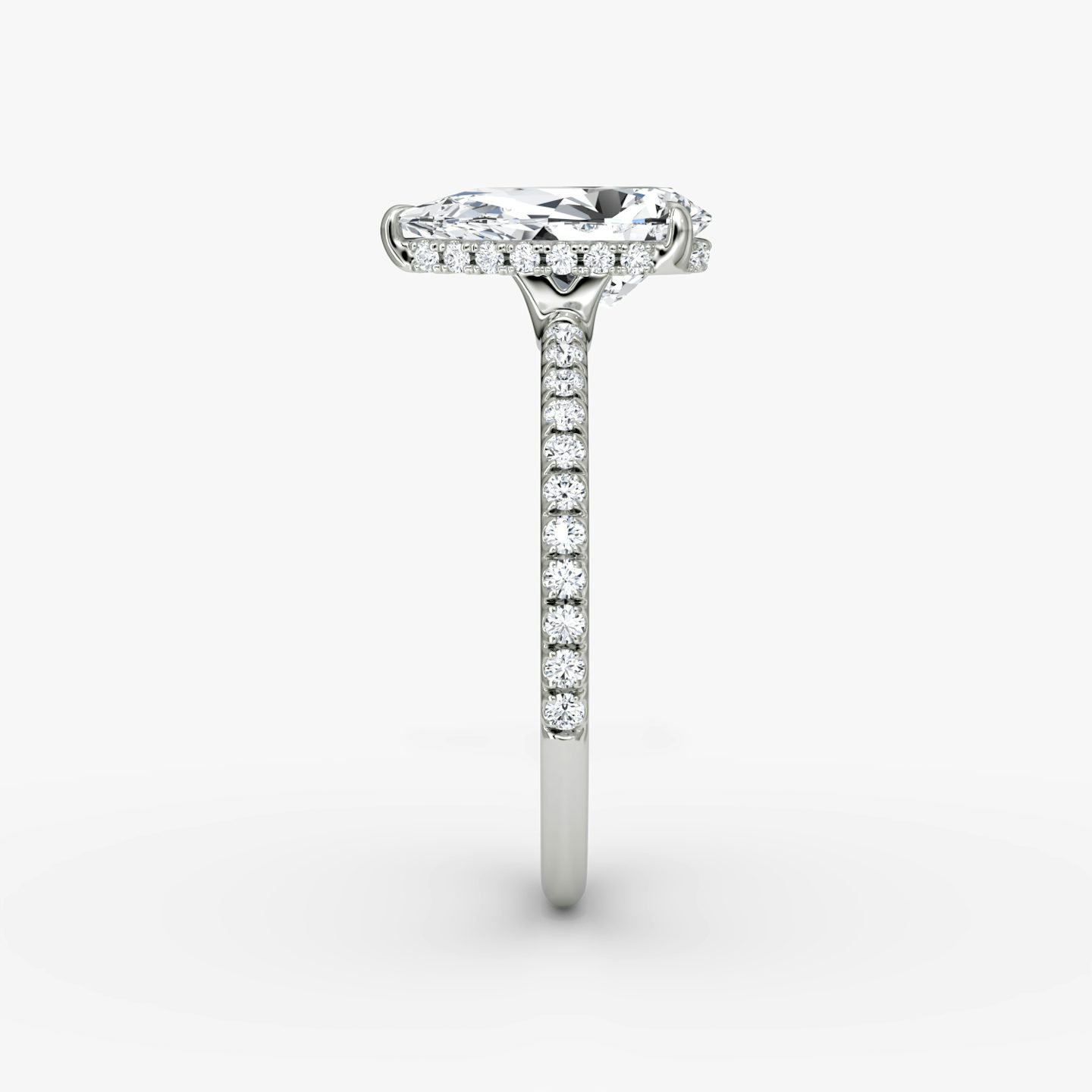 The Signature | Pear | Platinum | Band width: Standard | Band: Pavé | Setting style: Hidden Halo | Diamond orientation: vertical | Carat weight: See full inventory
