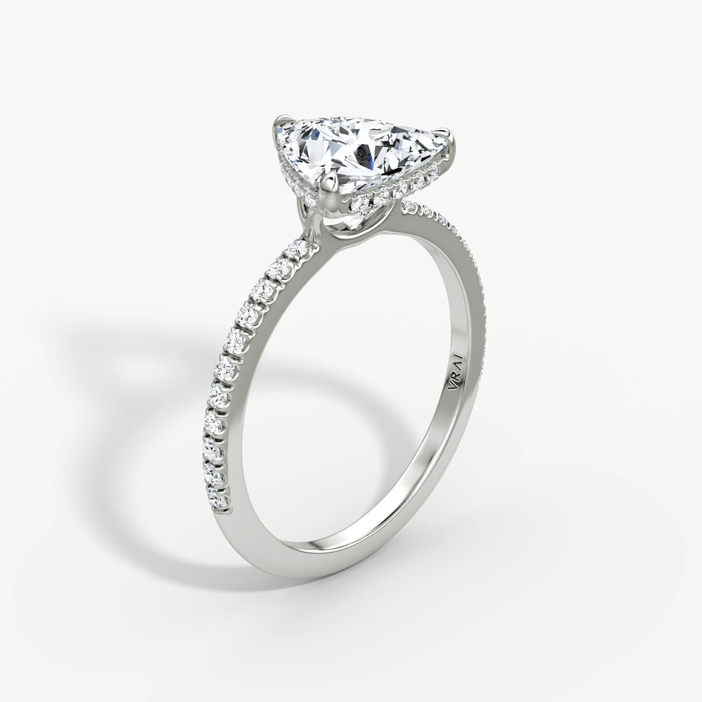 The Signature | Trillion | Platinum | Band width: Standard | Band: Pavé | Setting style: Hidden Halo | Diamond orientation: vertical | Carat weight: See full inventory