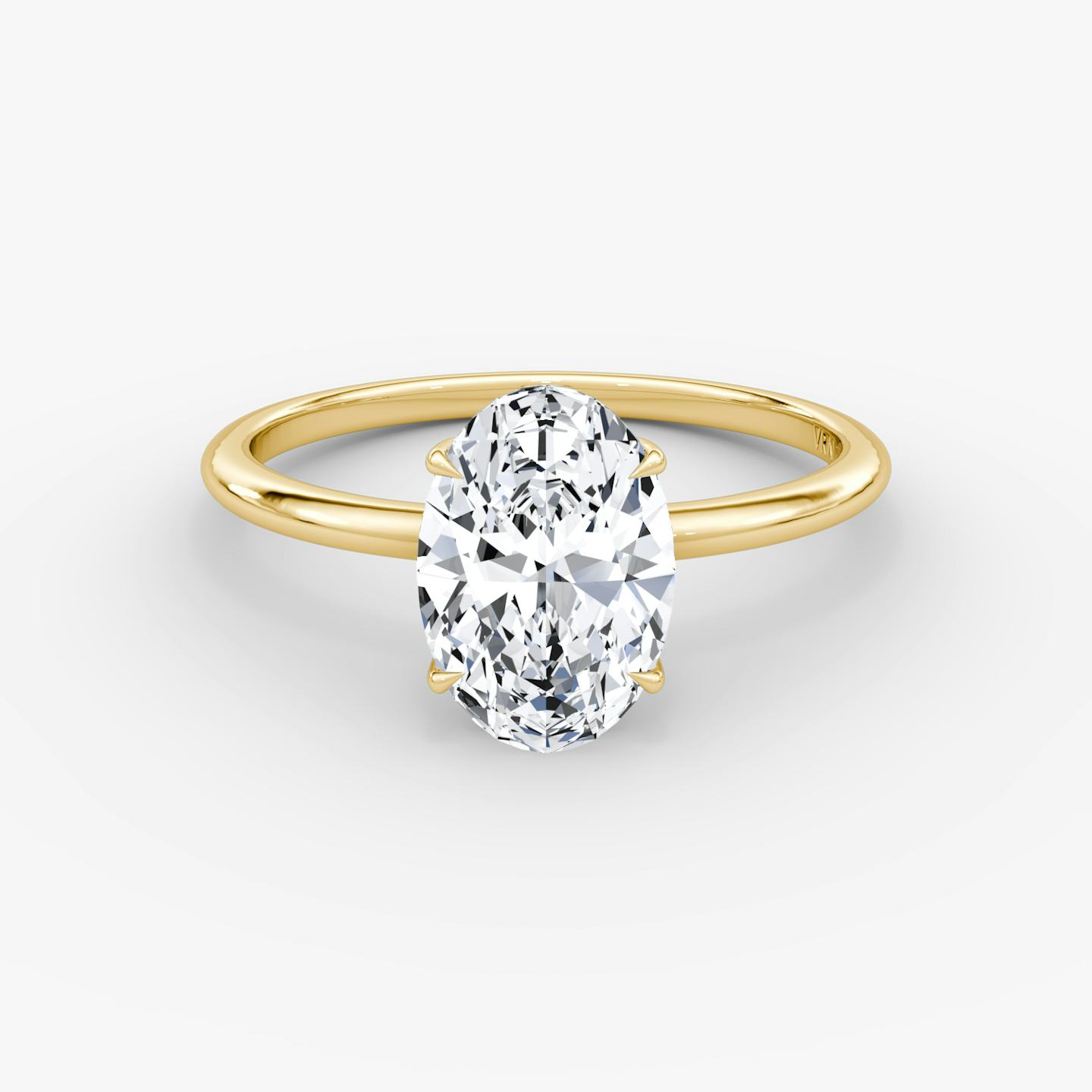 The Signature | Oval | 18k | 18k Yellow Gold | Band width: Standard | Band: Plain | Setting style: Hidden Halo | Diamond orientation: vertical | Carat weight: See full inventory