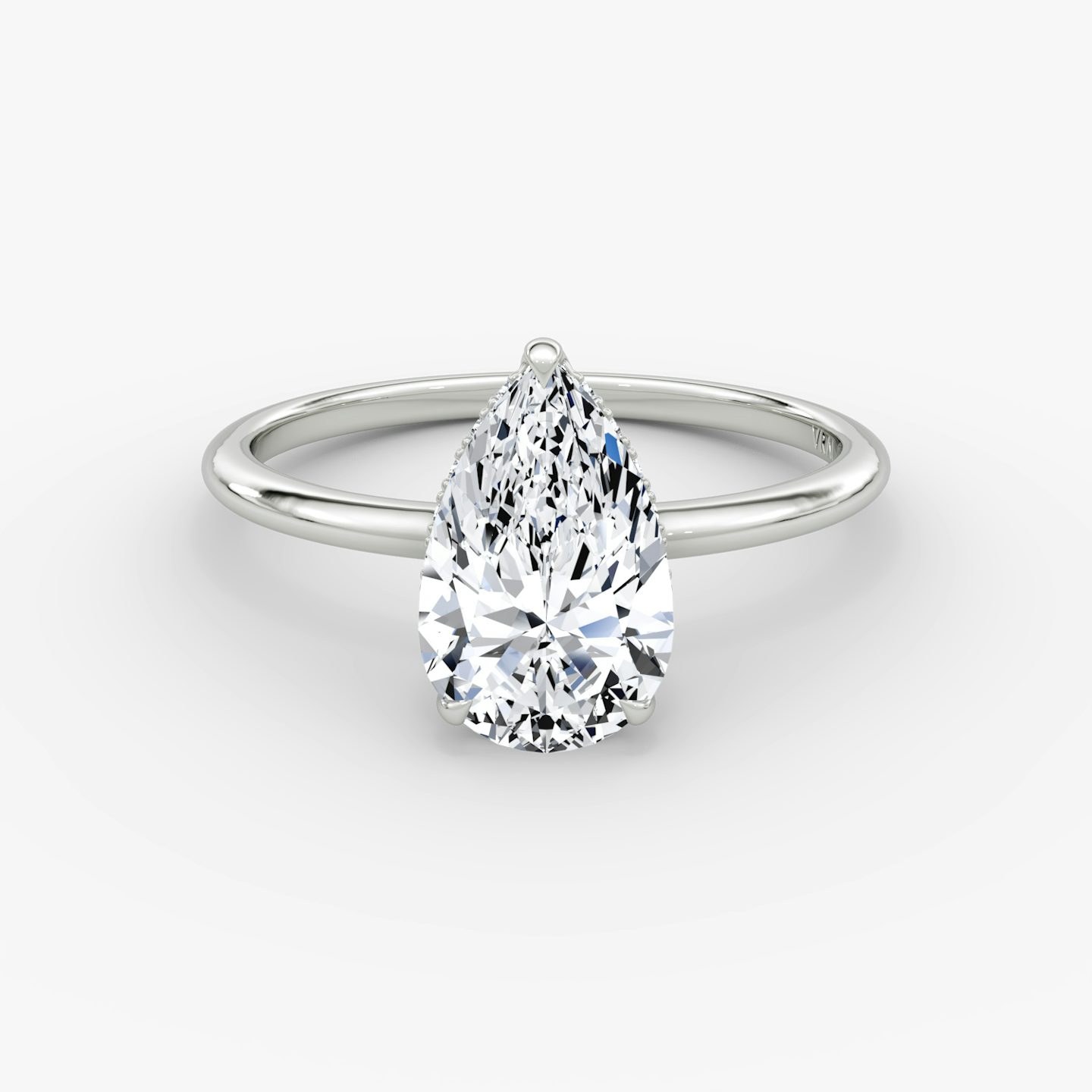 The Signature | Pear | Platinum | Band: Plain | Band width: Standard | Setting style: Hidden Halo | Diamond orientation: vertical | Carat weight: See full inventory