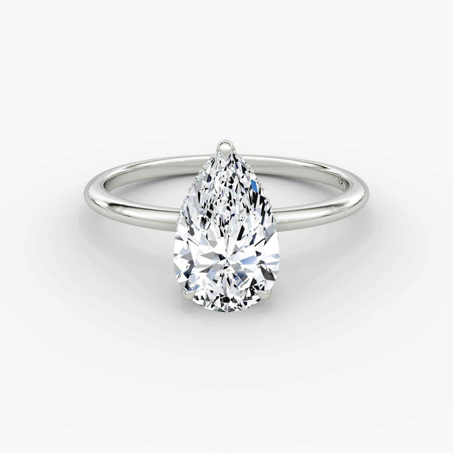 The Signature | Pear | Platinum | Band width: Standard | Band: Plain | Setting style: Hidden Halo | Diamond orientation: vertical | Carat weight: See full inventory