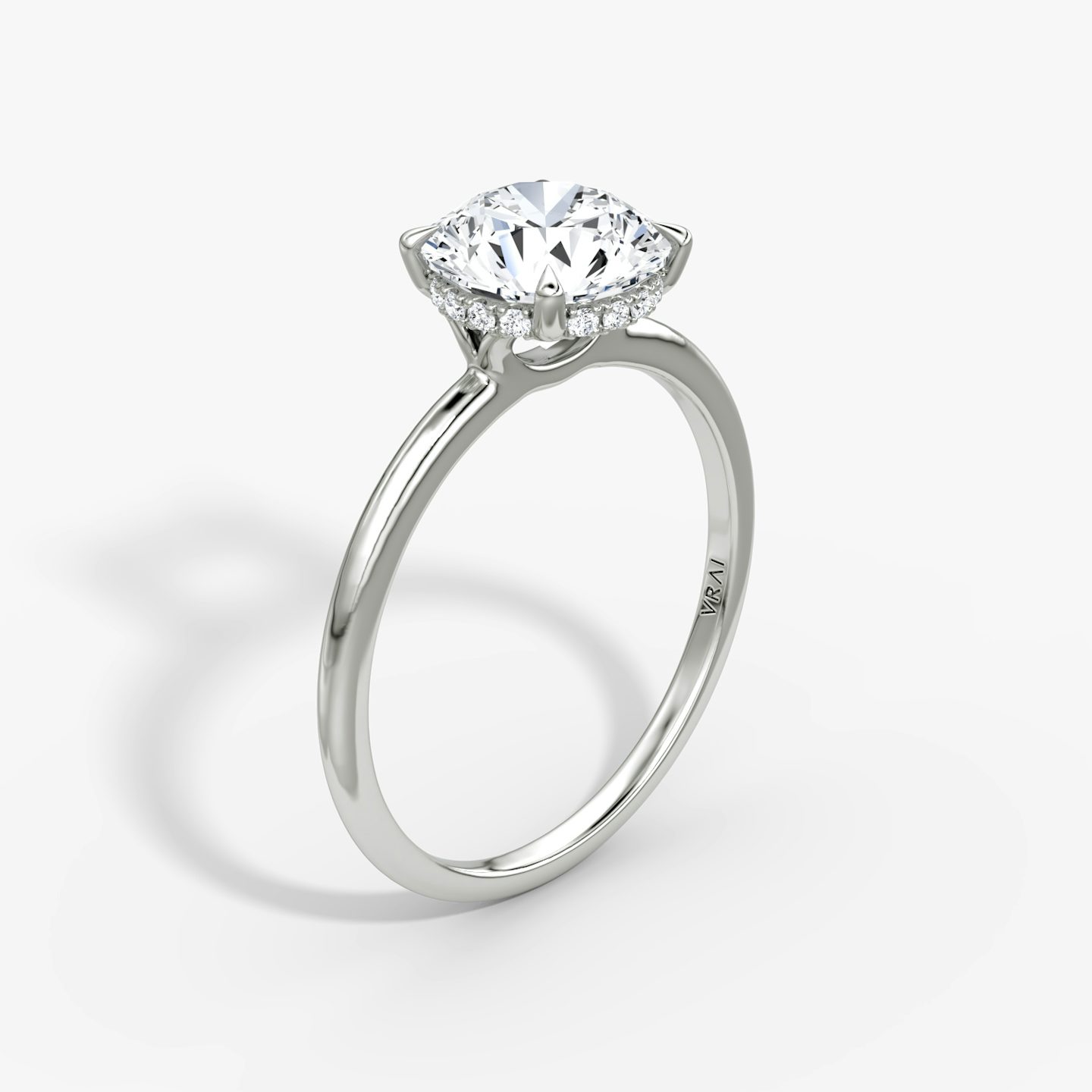 The Signature | Round Brilliant | 18k | 18k White Gold | Band: Plain | Band width: Standard | Carat weight: See full inventory | Setting style: Hidden Halo | Diamond orientation: vertical