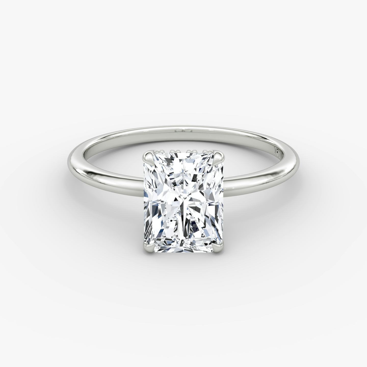 The Signature | Radiant | Platinum | Band width: Standard | Band: Plain | Setting style: Hidden Halo | Diamond orientation: vertical | Carat weight: See full inventory
