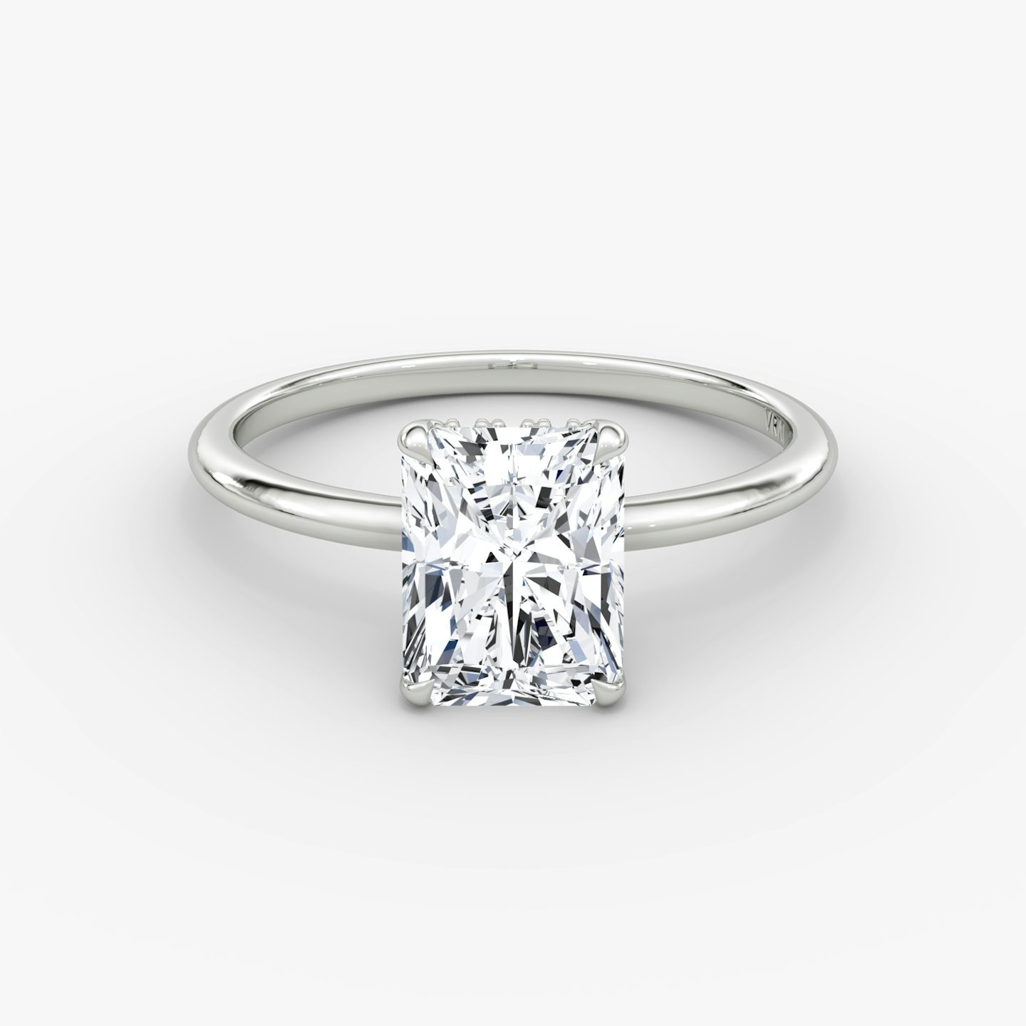 The Signature | Radiant | Platinum | Band width: Standard | Band: Plain | Setting style: Hidden Halo | Diamond orientation: vertical | Carat weight: See full inventory