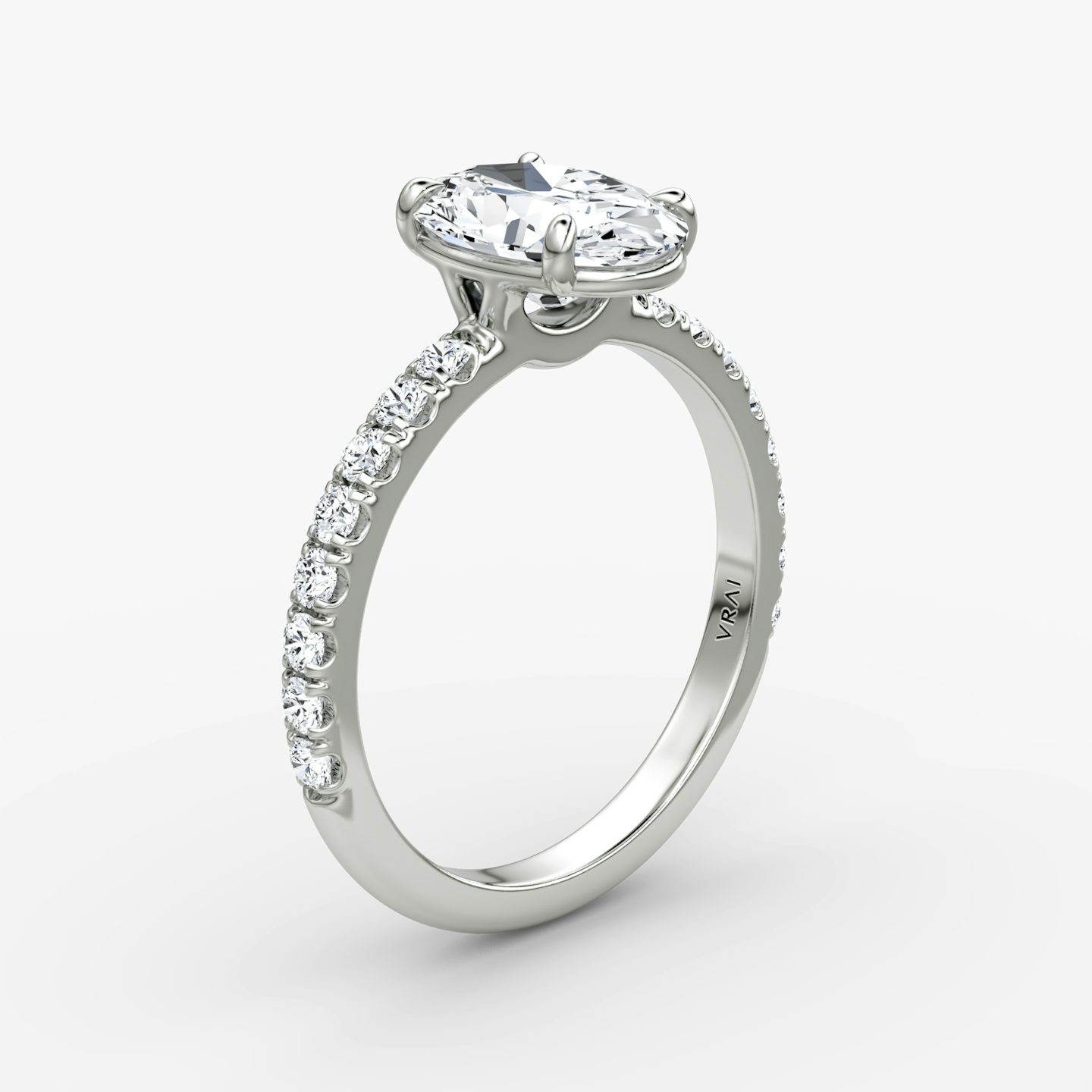 The Signature | Oval | Platinum | Band: Pavé | Band width: Large | Setting style: Plain | Diamond orientation: vertical | Carat weight: See full inventory
