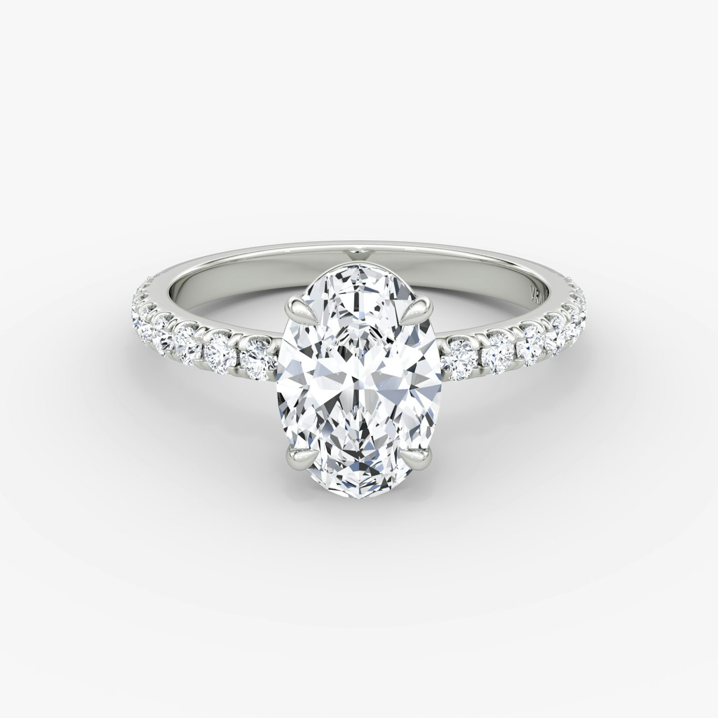 The Signature | Oval | Platinum | Band width: Large | Band: Pavé | Setting style: Plain | Diamond orientation: vertical | Carat weight: See full inventory