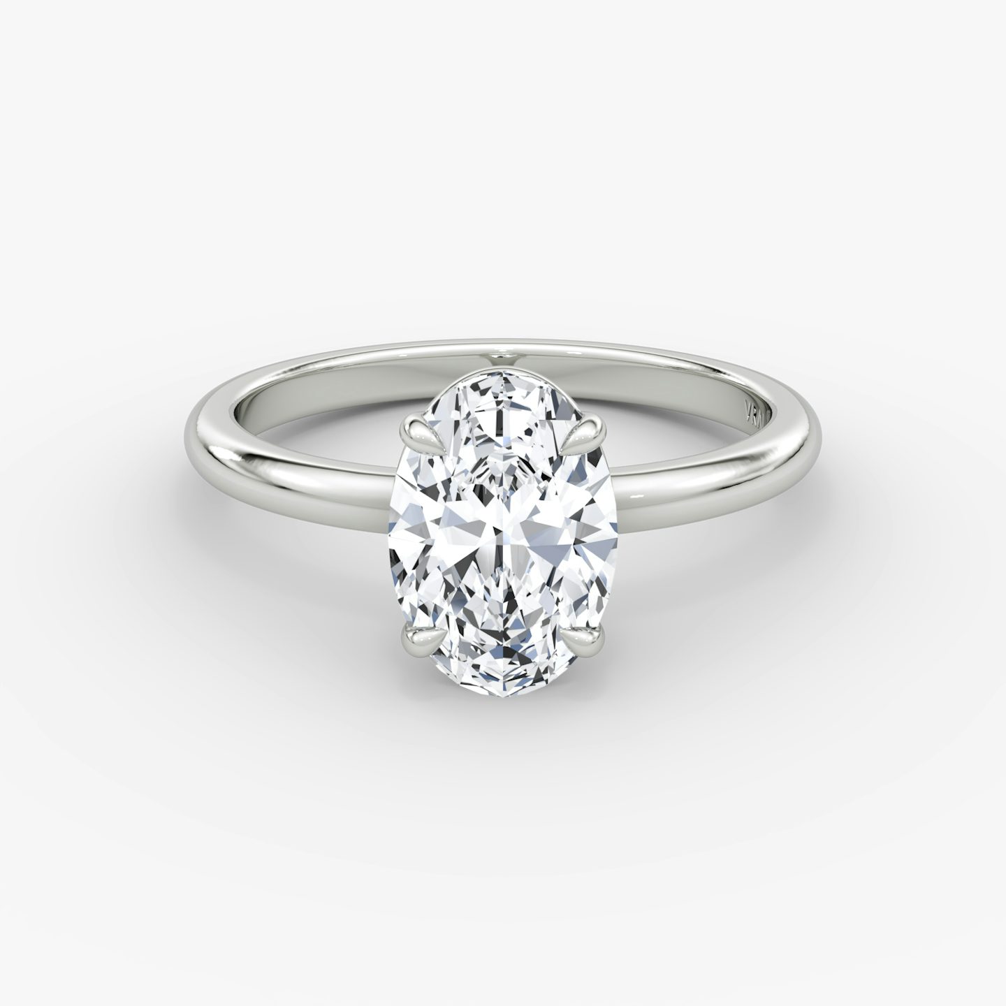 The Signature | Oval | Platinum | Band: Plain | Band width: Large | Setting style: Plain | Diamond orientation: vertical | Carat weight: See full inventory
