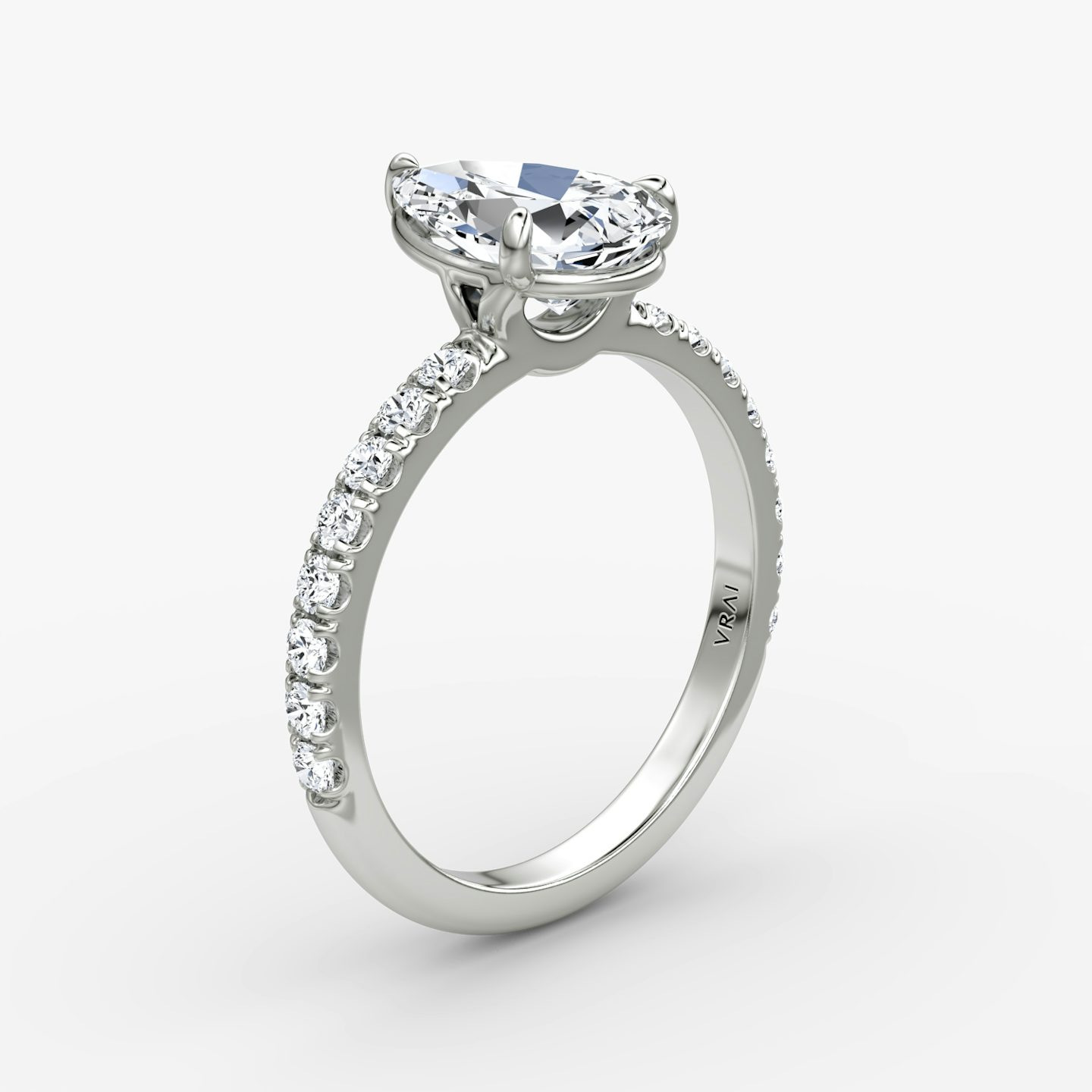 The Signature | Pear | Platinum | Band: Pavé | Band width: Large | Setting style: Plain | Diamond orientation: vertical | Carat weight: See full inventory