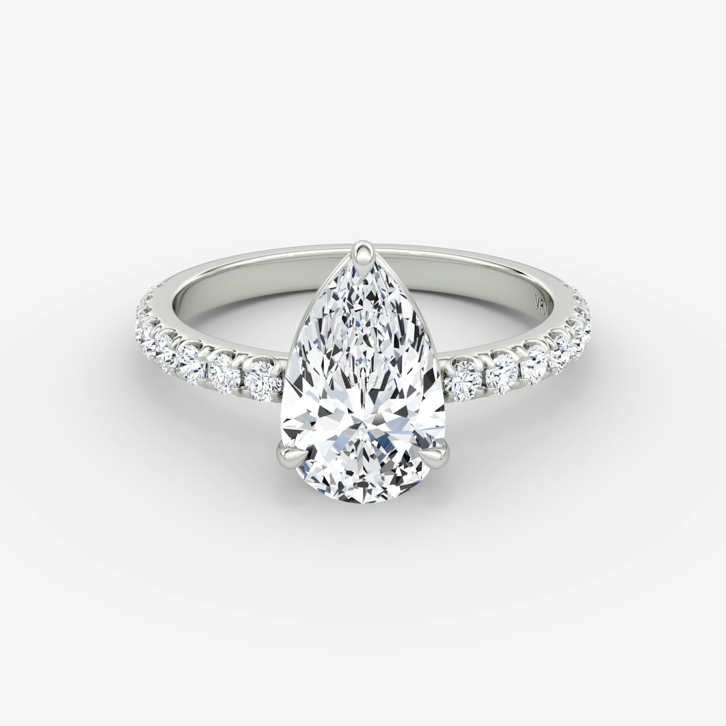 The Signature | Pear | Platinum | Band: Pavé | Band width: Large | Setting style: Plain | Diamond orientation: vertical | Carat weight: See full inventory