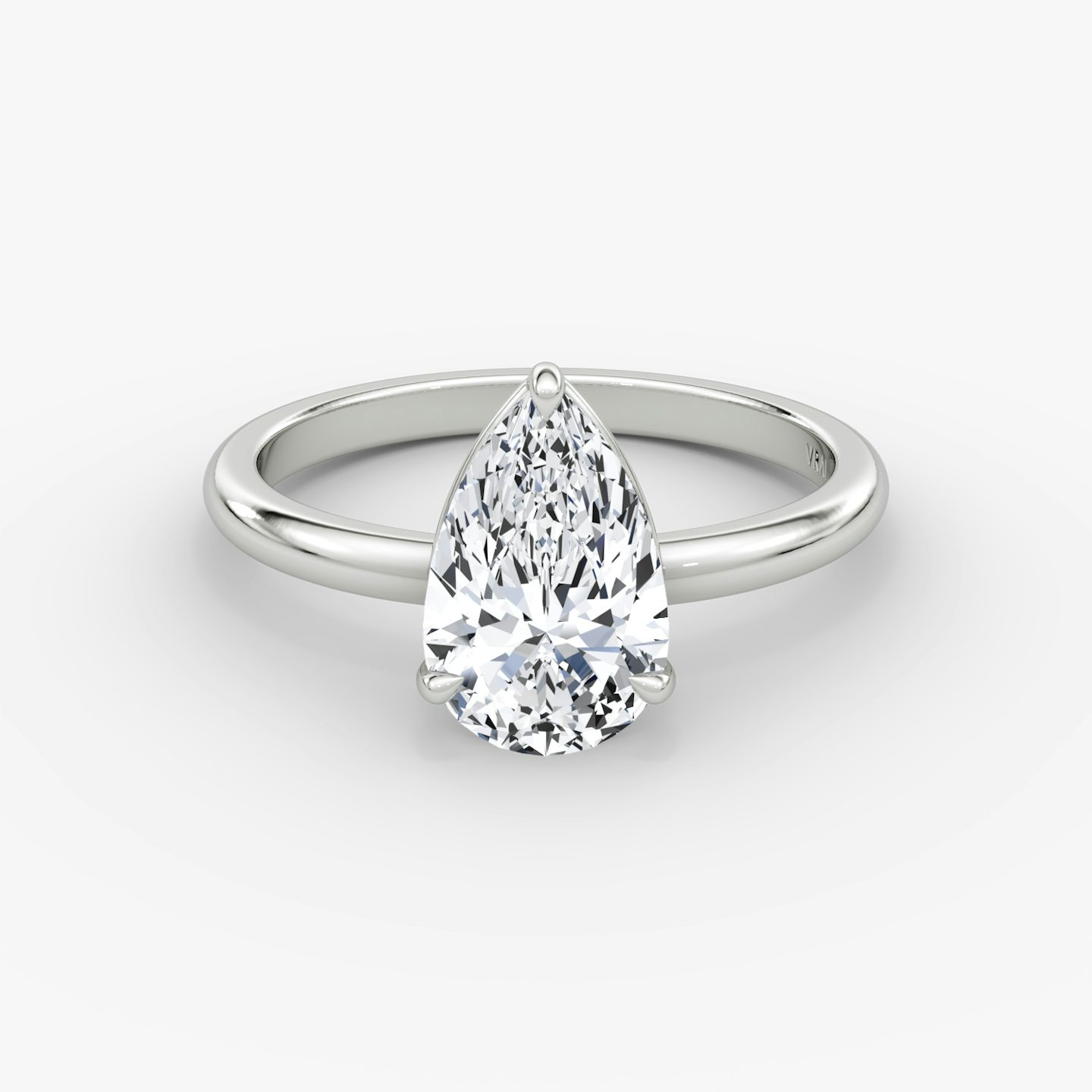 The Signature | Pear | Platinum | Band: Plain | Band width: Large | Setting style: Plain | Diamond orientation: vertical | Carat weight: See full inventory