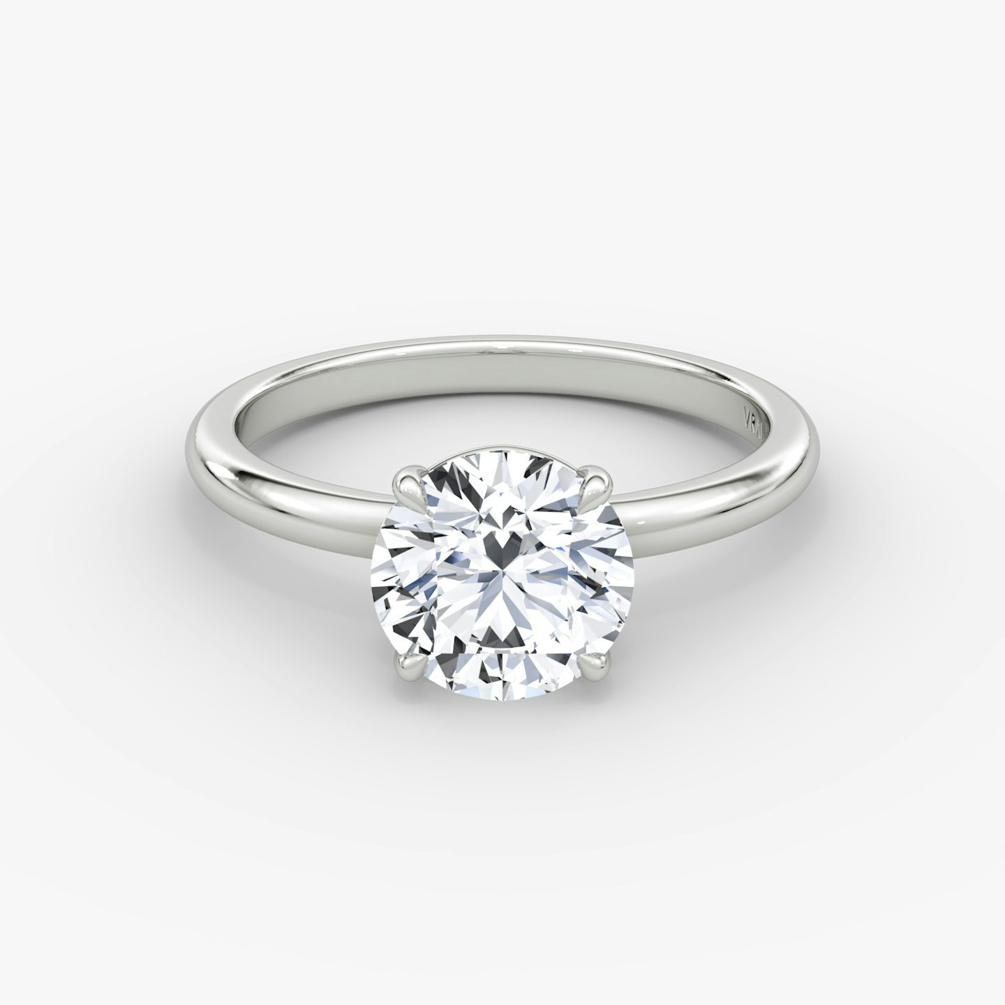 The Signature | Round Brilliant | Platinum | Band width: Large | Band: Plain | Setting style: Plain | Carat weight: See full inventory | Diamond orientation: vertical